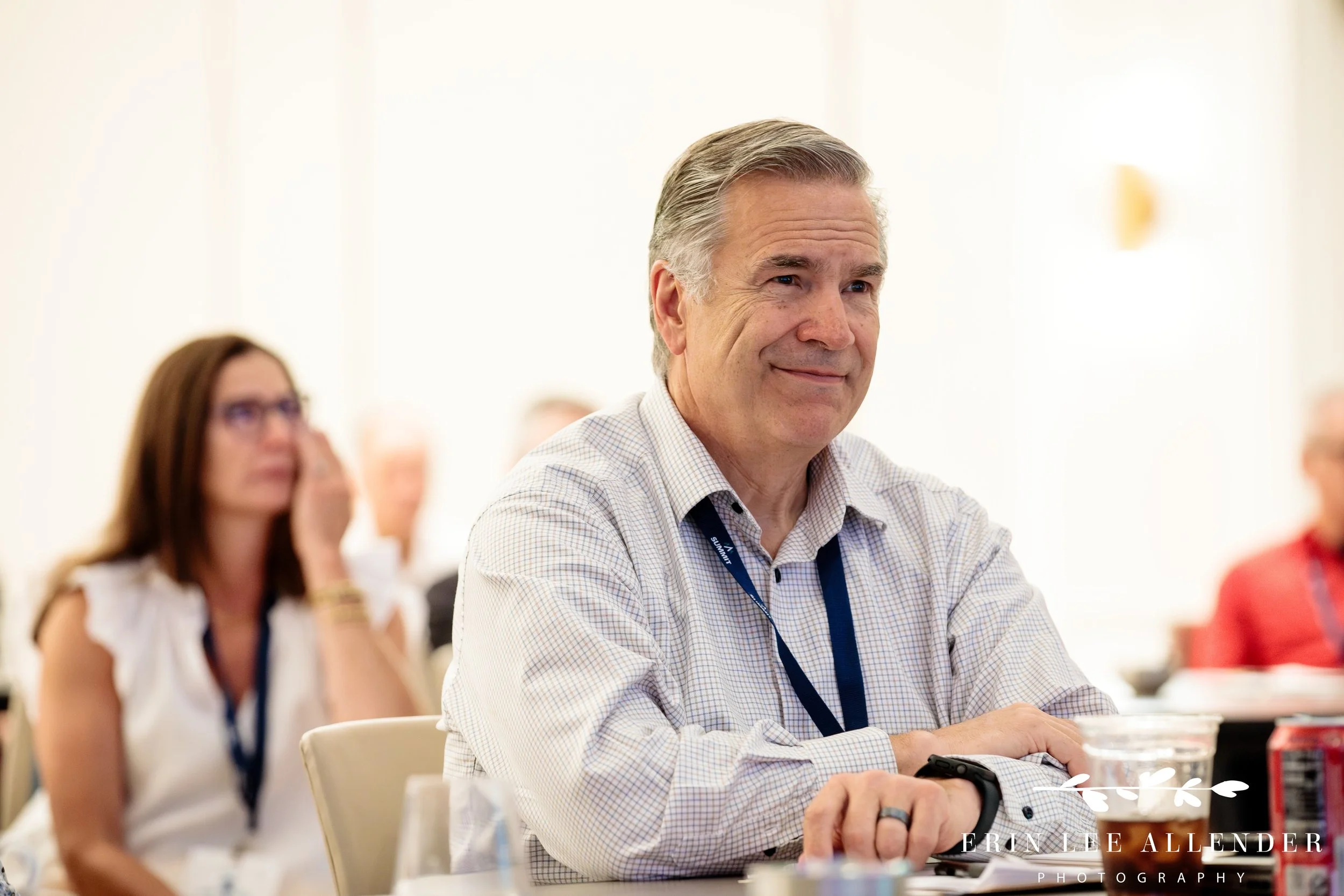 Nashville event photography — candid attendee reaction shot during CBIZ Nashville Summit session at The Conrad