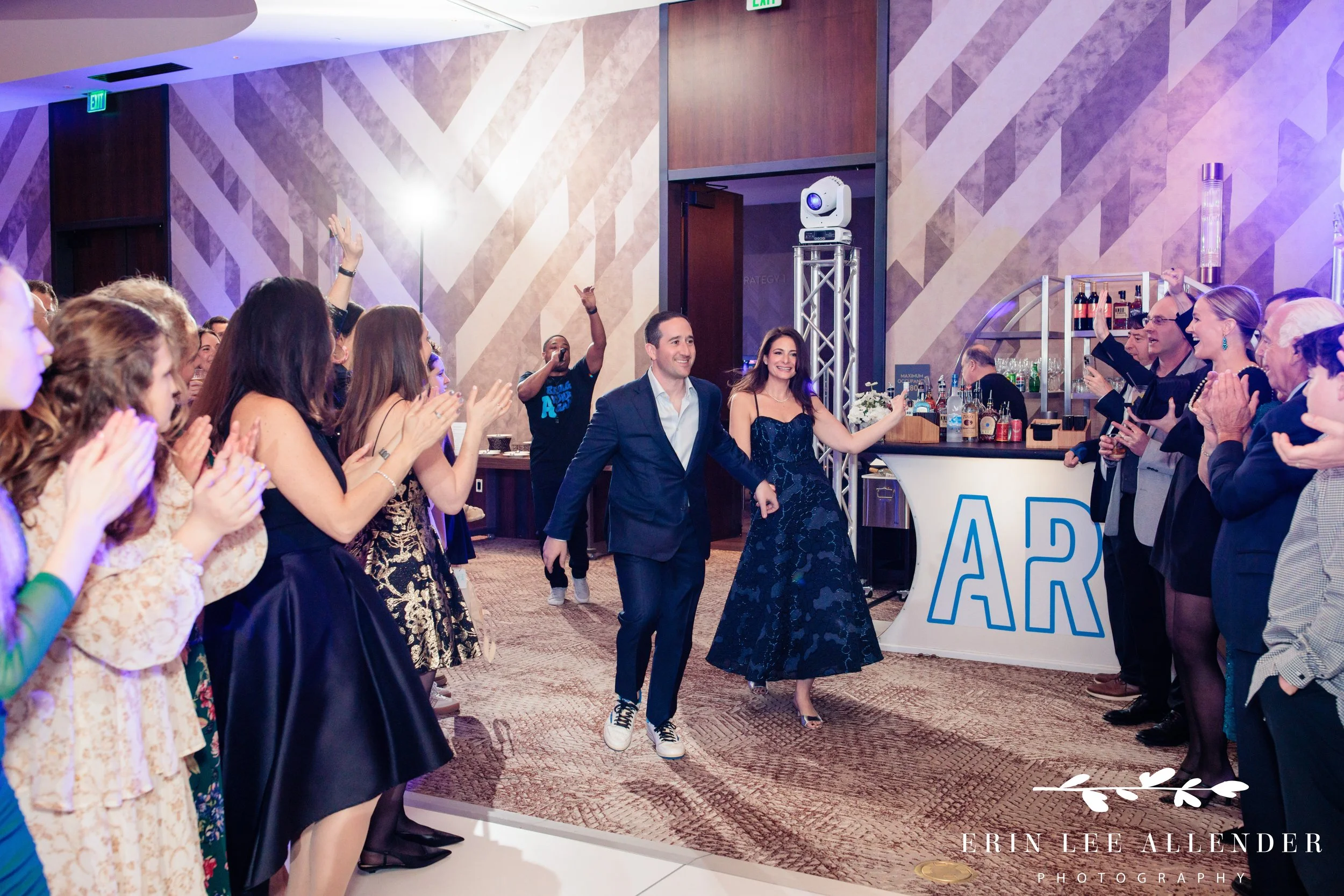 Grand entrance of parents running into W Nashville reception