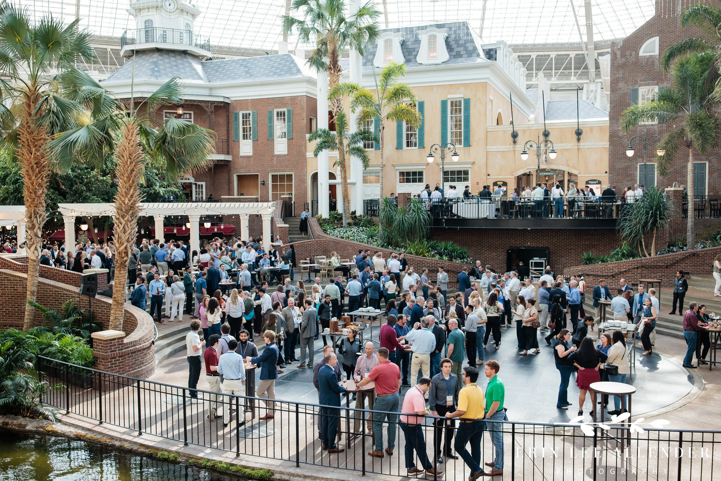 Nashville conference photographer capturing a wide elevated view of the full RubinBrown conference cocktail party on Delta Island at Gaylord Opryland Resort