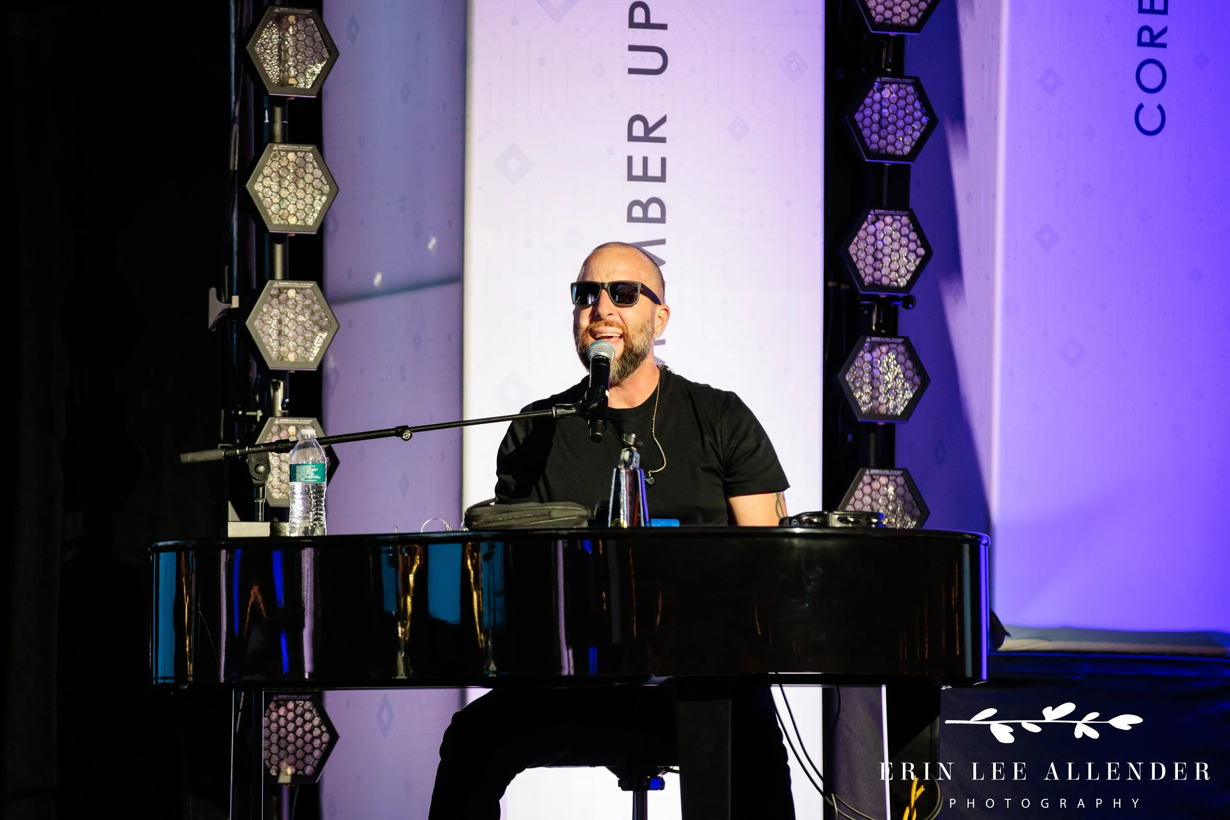 Nashville corporate event photographer capturing a close-up of the Music City Dueling Pianos performers during RubinBrown's awards dinner at Opryland