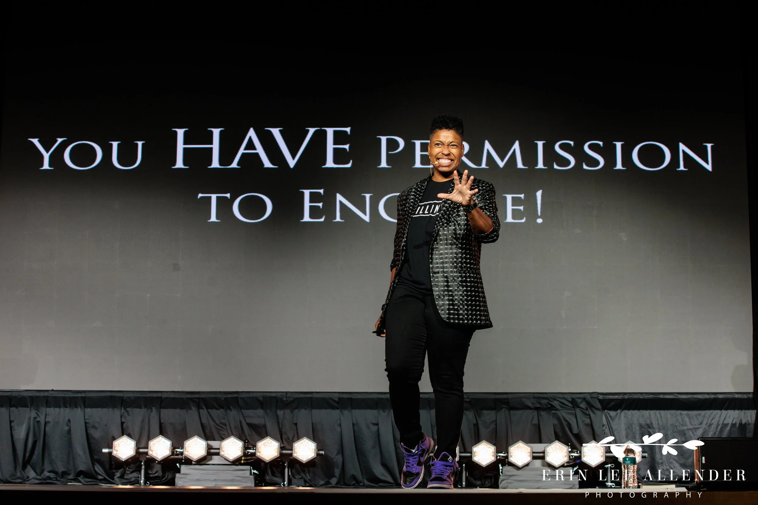 Nashville conference photographer capturing Vernice Armour's 'permission to engage' call to action closing her keynote at RubinBrown's conference at Gaylord Opryland Resort