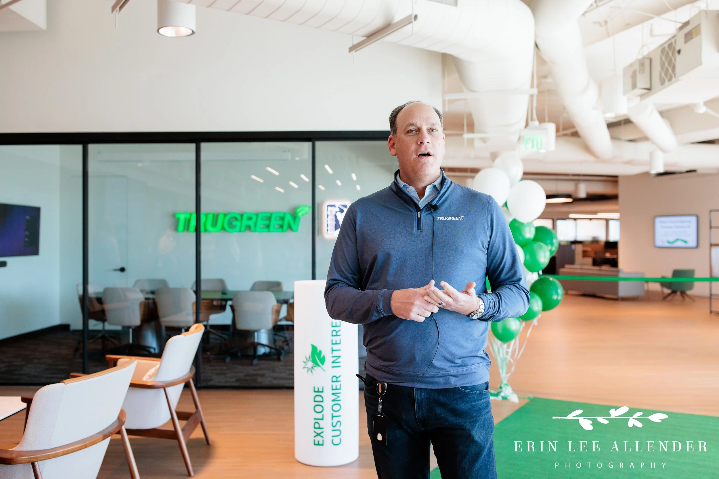 Nashville corporate photographer — TruGreen CEO speaking with office staff at ribbon cutting event in Middle Tennessee