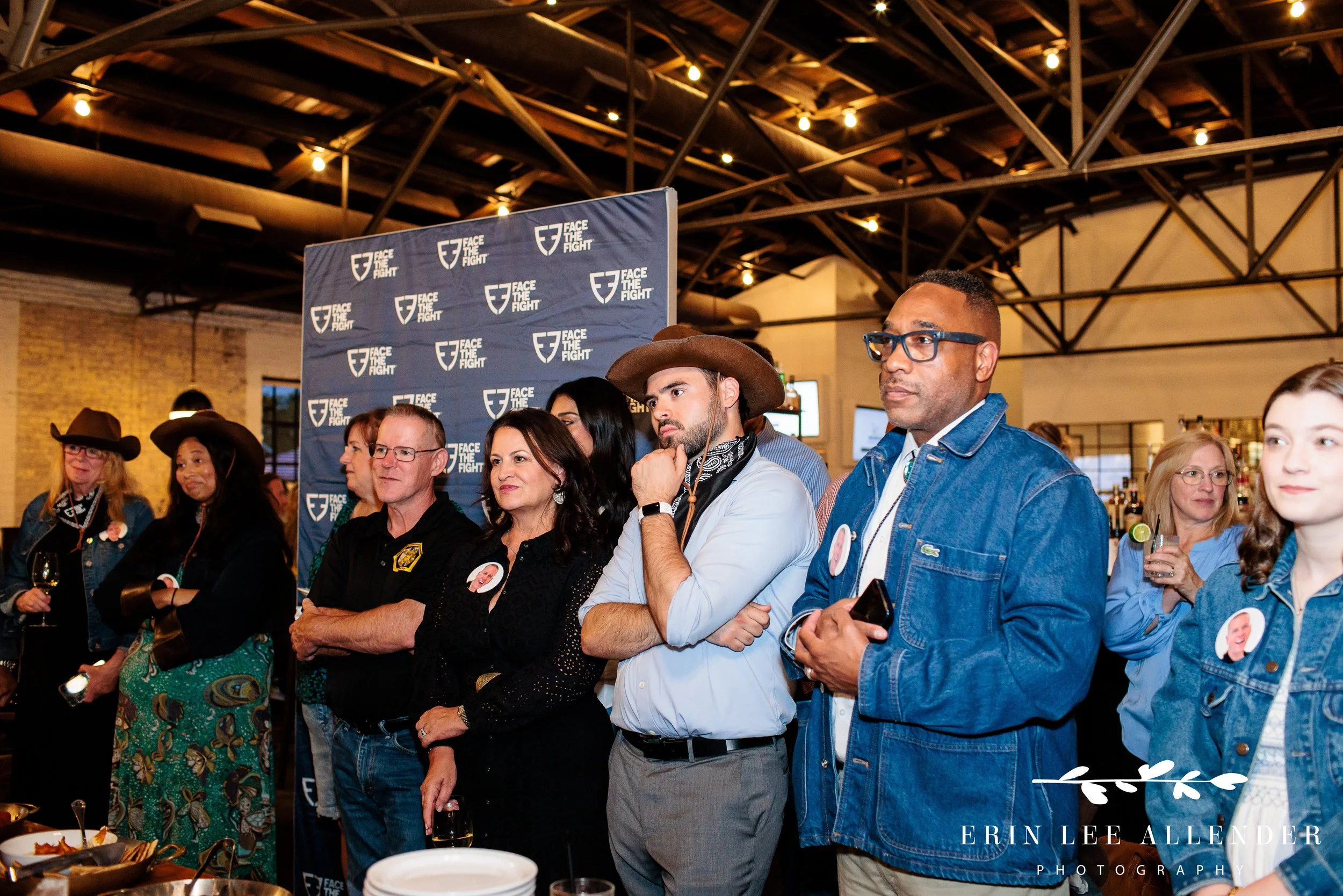 Audience reacting during guest of honor speech at Face the Fight event