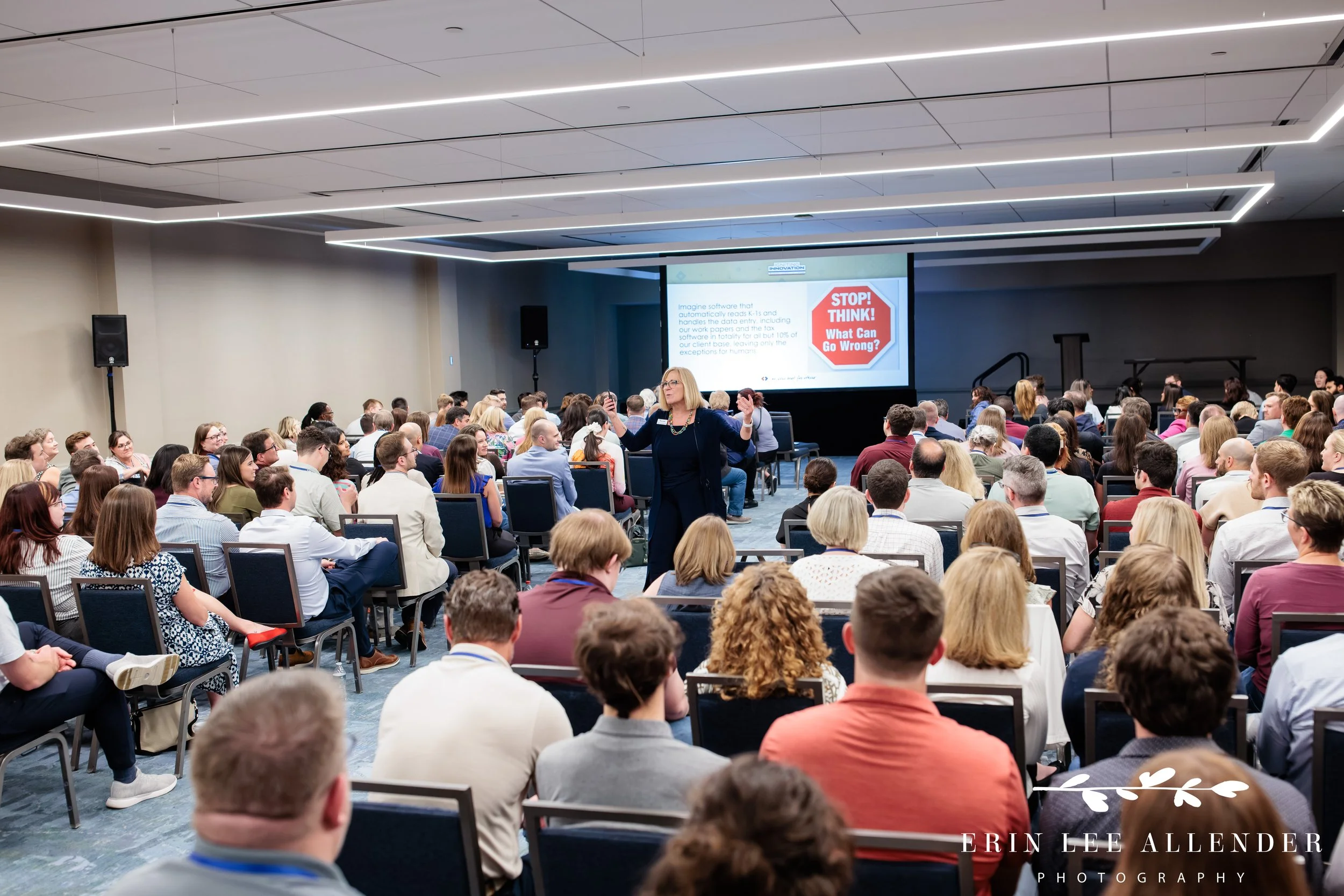 Nashville corporate event photographer covering a speaker addressing a full breakout room at Gaylord Opryland Resort