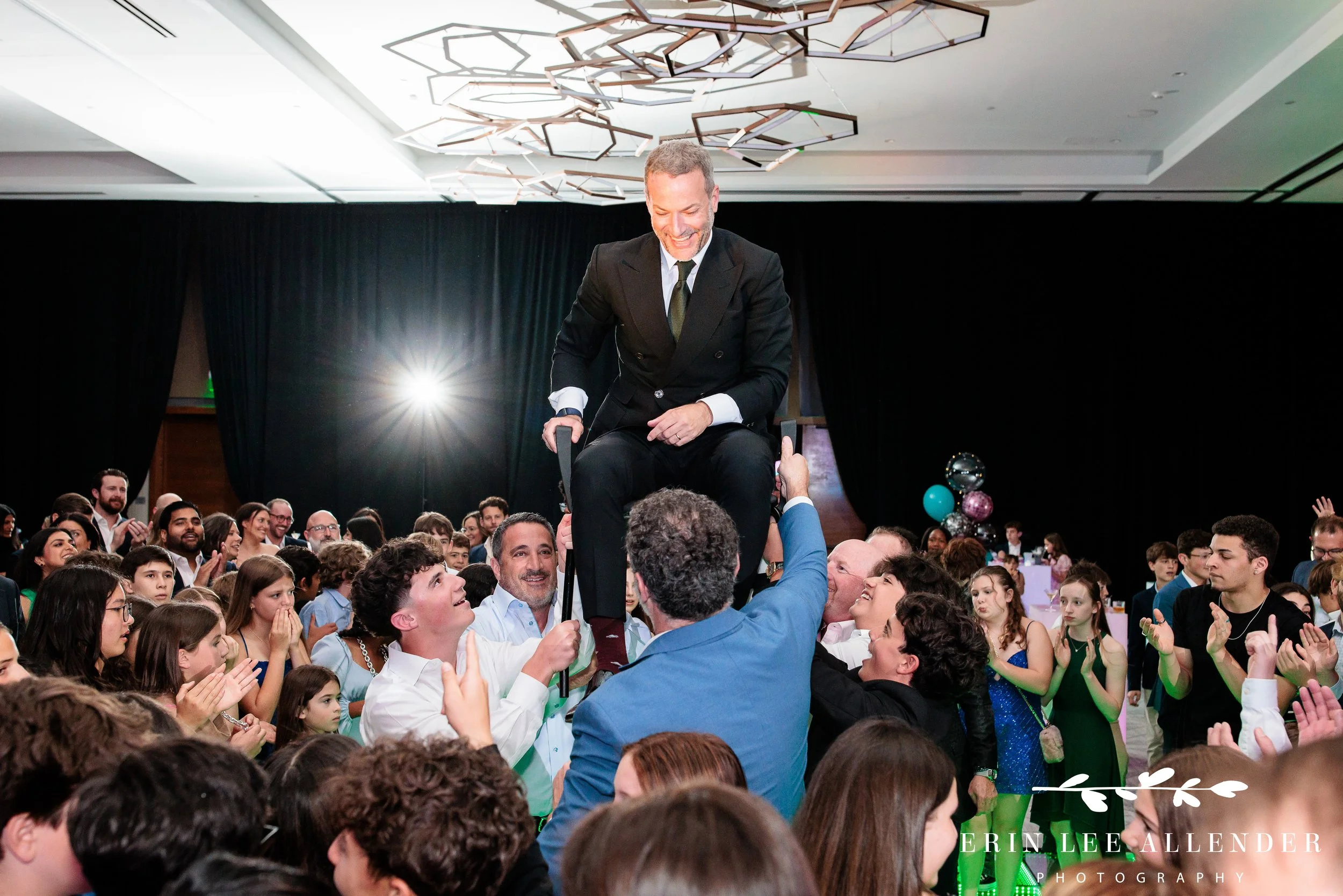 Father lifted during hora