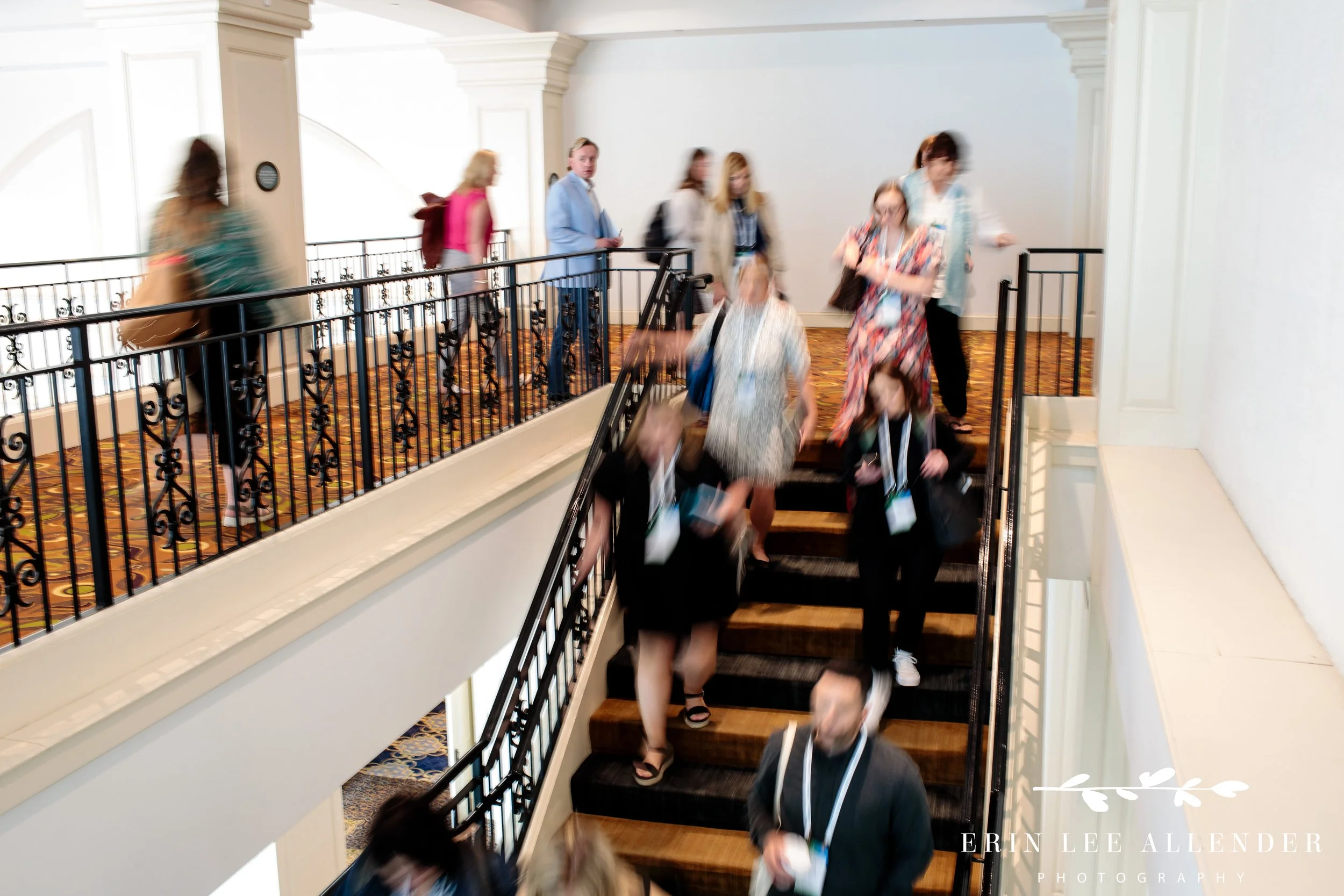 Attendees exiting breakout sessions at CX corporate conference Gaylord Opryland Hotel