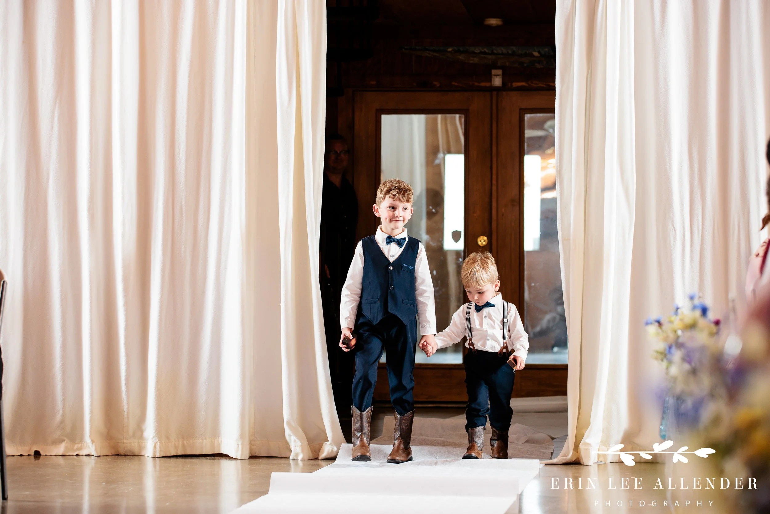 Bride's son walking down the aisle.