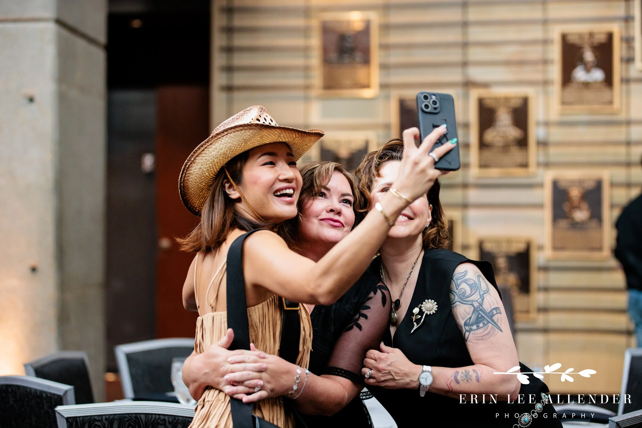 selfie being taken at cocktail hour of awards ceremony at country music hall of fame