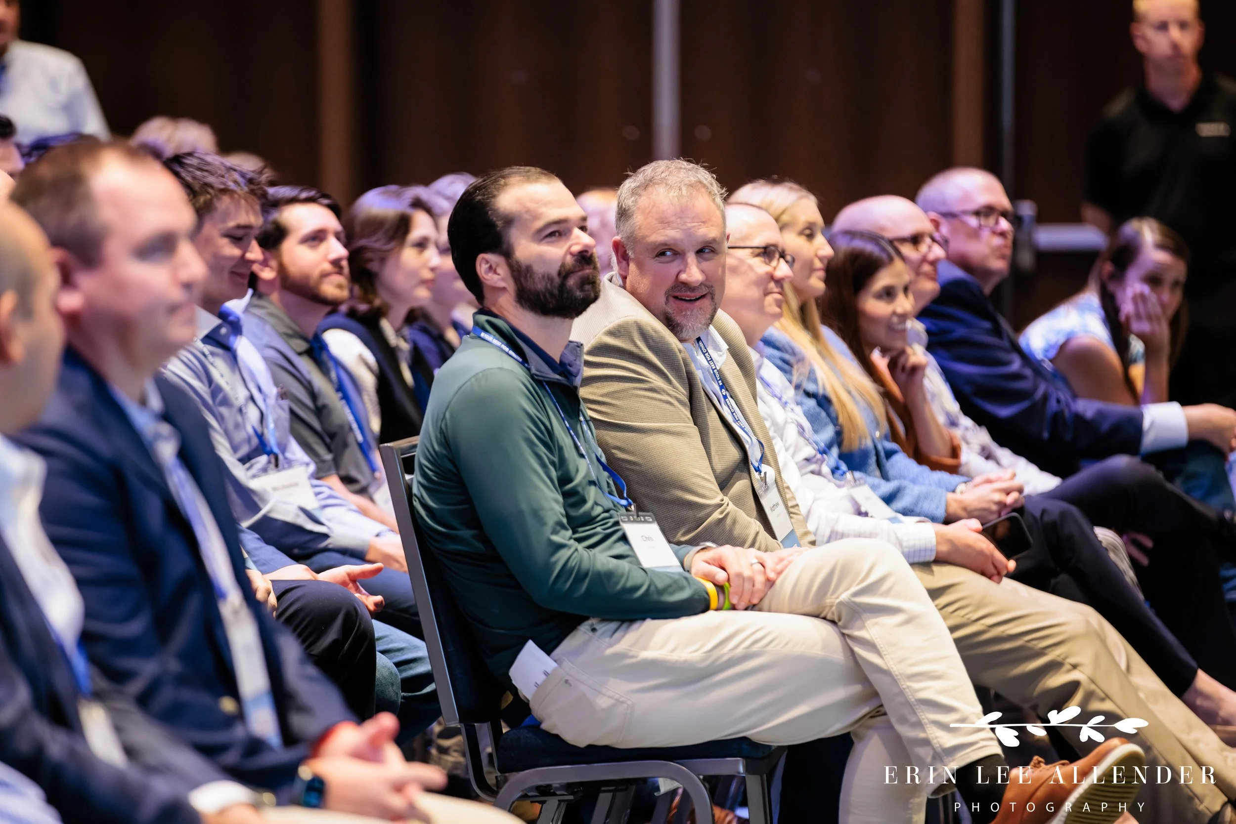 Opryland Hotel corporate event photography of attendees laughing at the speaker during a breakout session