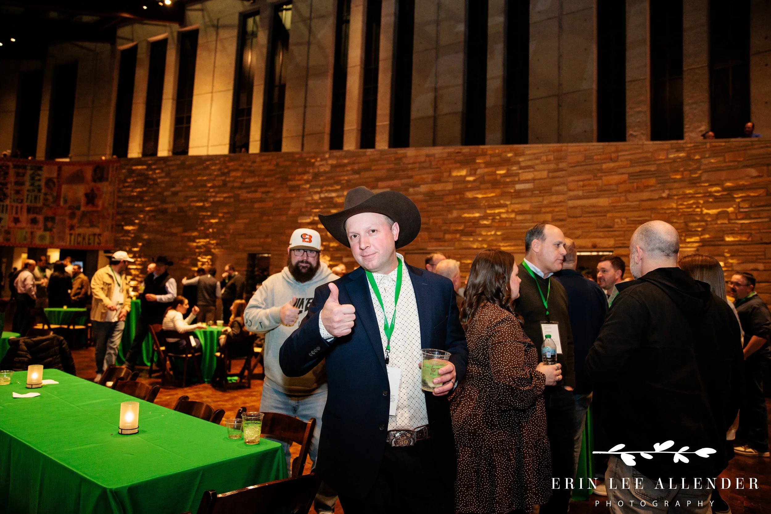 Nashville event photographer — TruGreen Leadership Summit attendee in a cowboy hat giving a thumbs up at the Country Music Hall of Fame welcome mixer