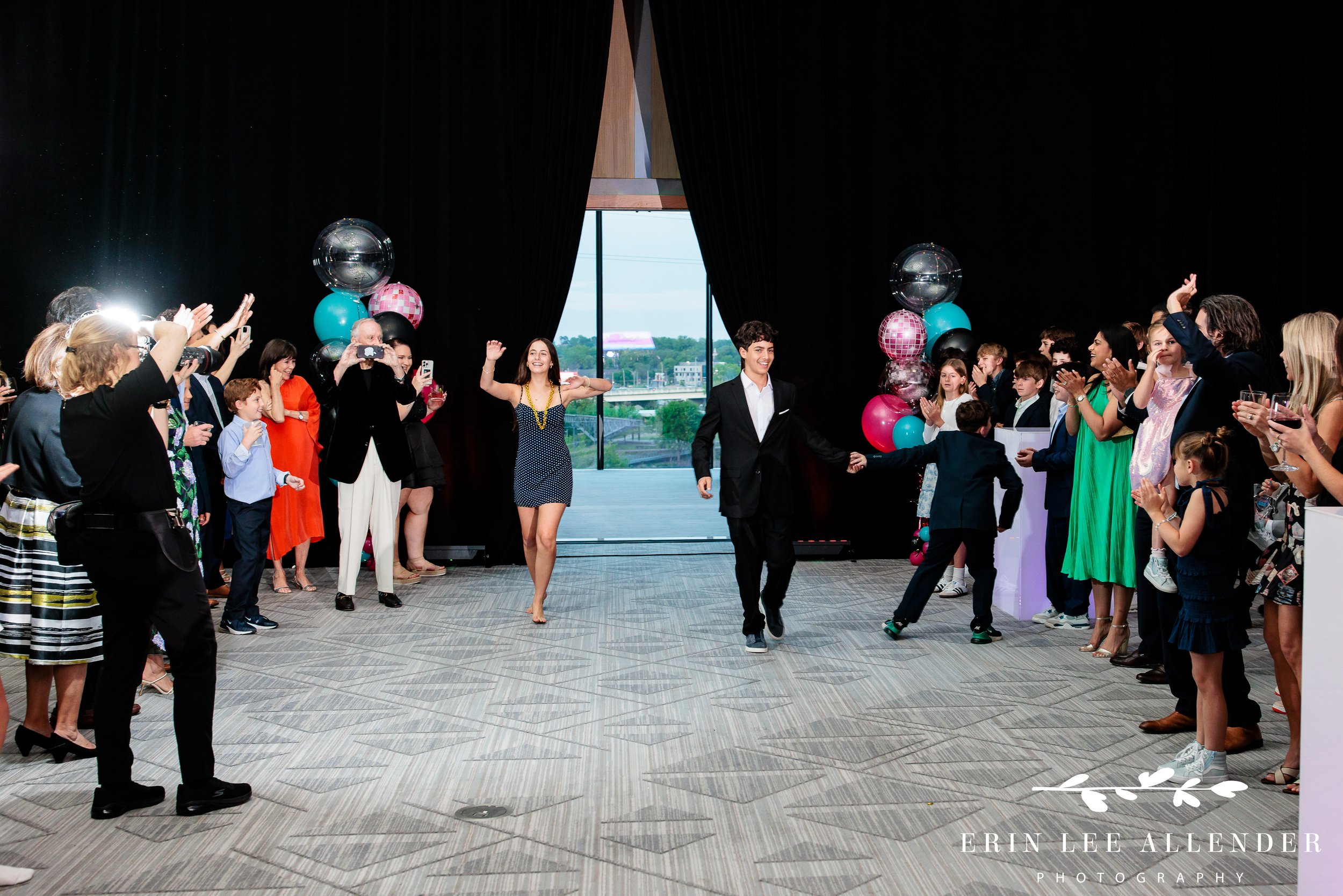 Siblings grand entrance into party