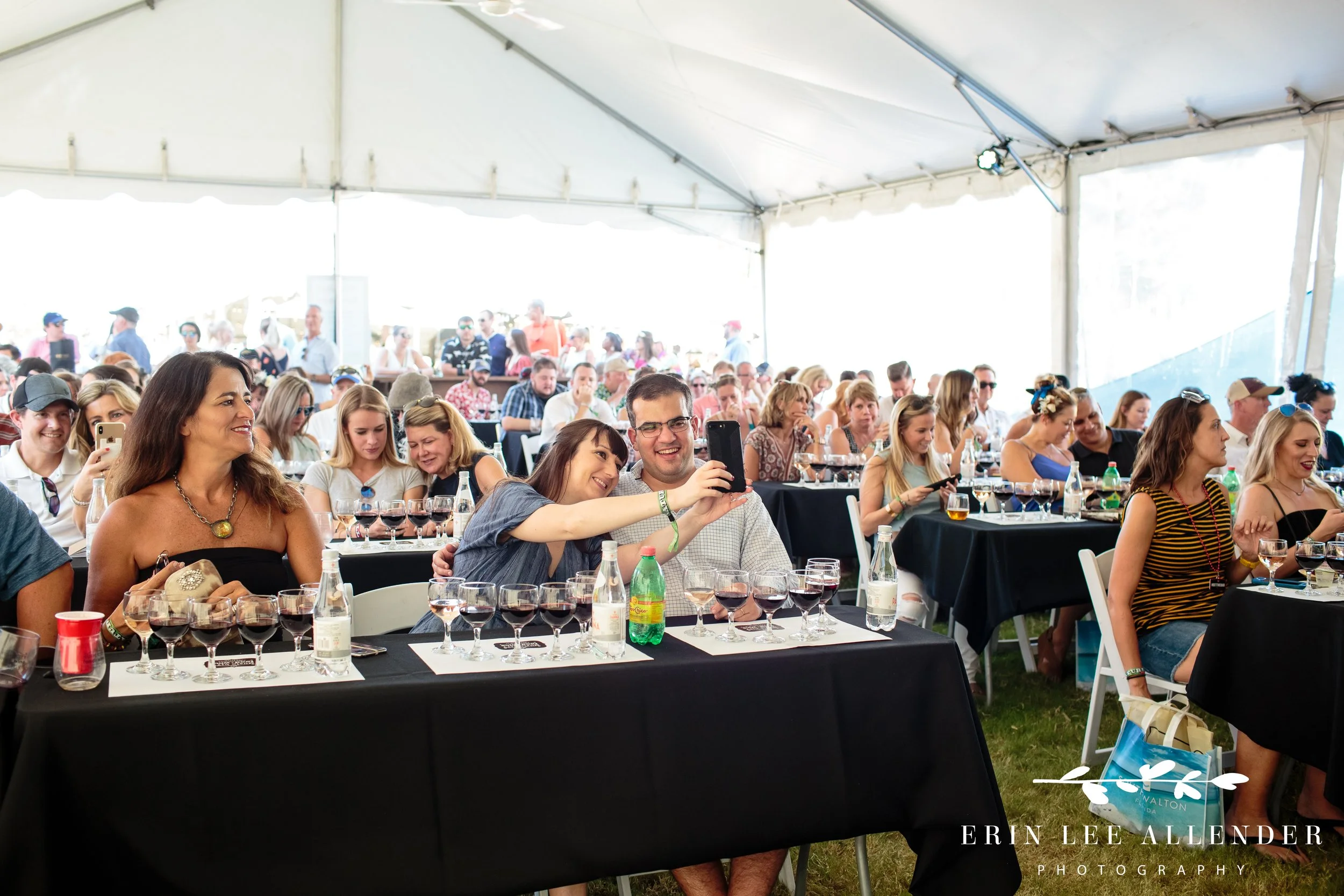 People taking a selfie in a packed tent before the tasting starts at the Music City Food and Wine Festival Nashville Tennessee