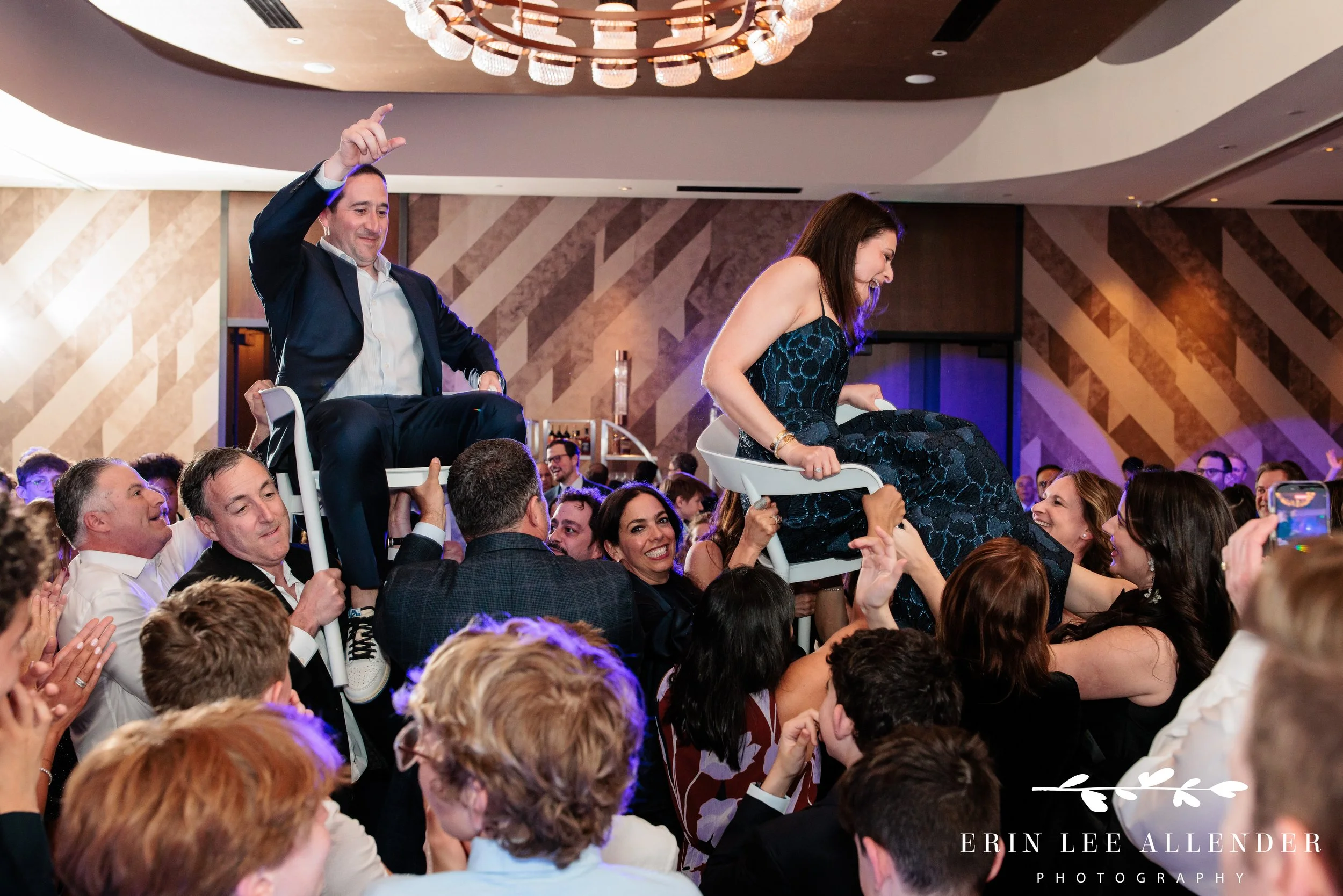 parents lifted during hora at W Nashville bar mitzvah party