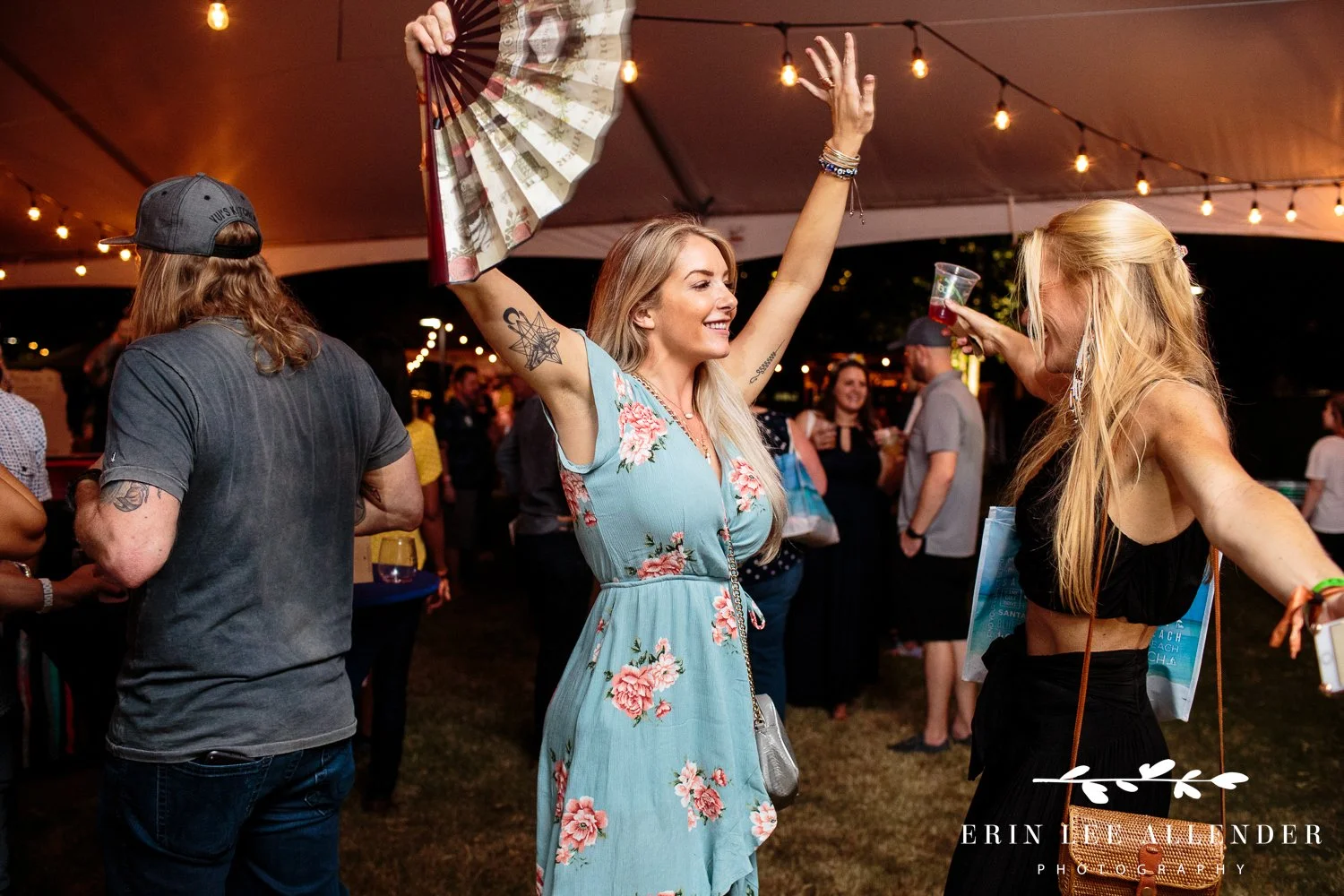 People dancing at night at the Music City Food and Wine Festival at Bicentennial Capitol Mall State Park Nashville Tennessee