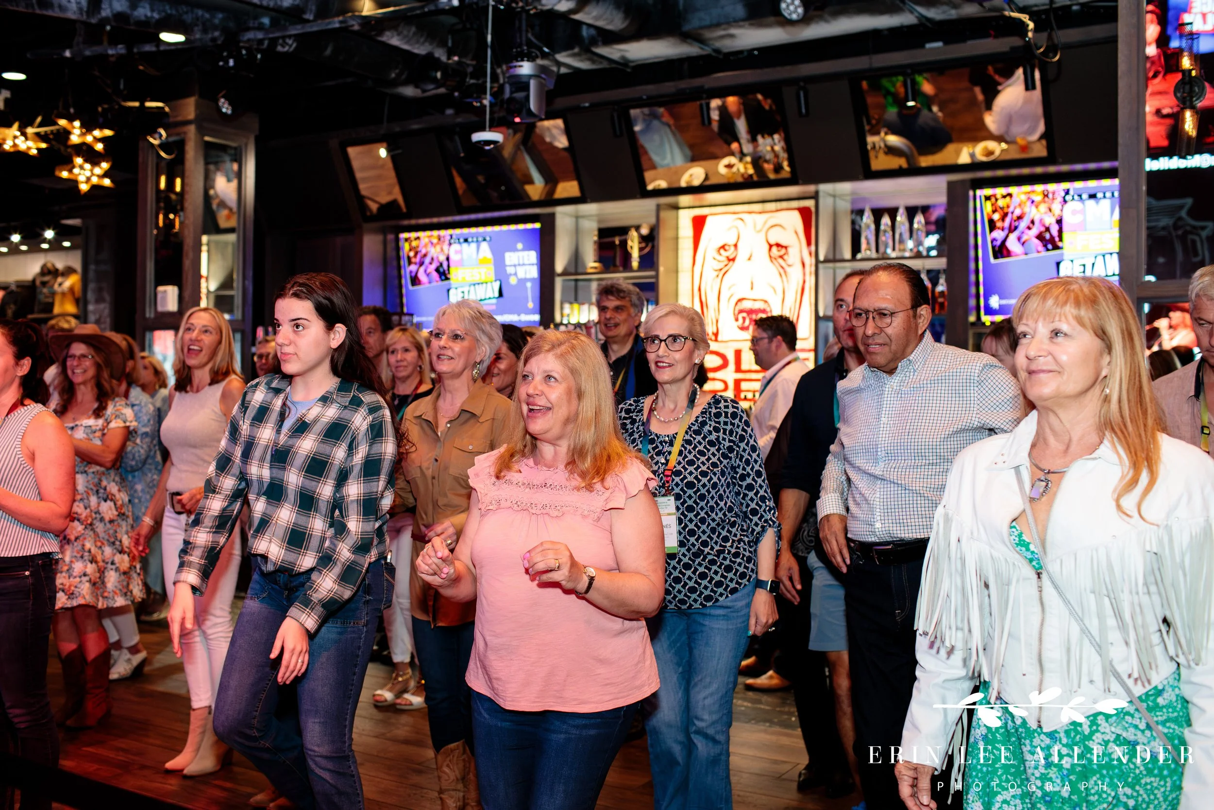 Guests dancing on the floor during corporate conference closing night at Ole Red Nashville