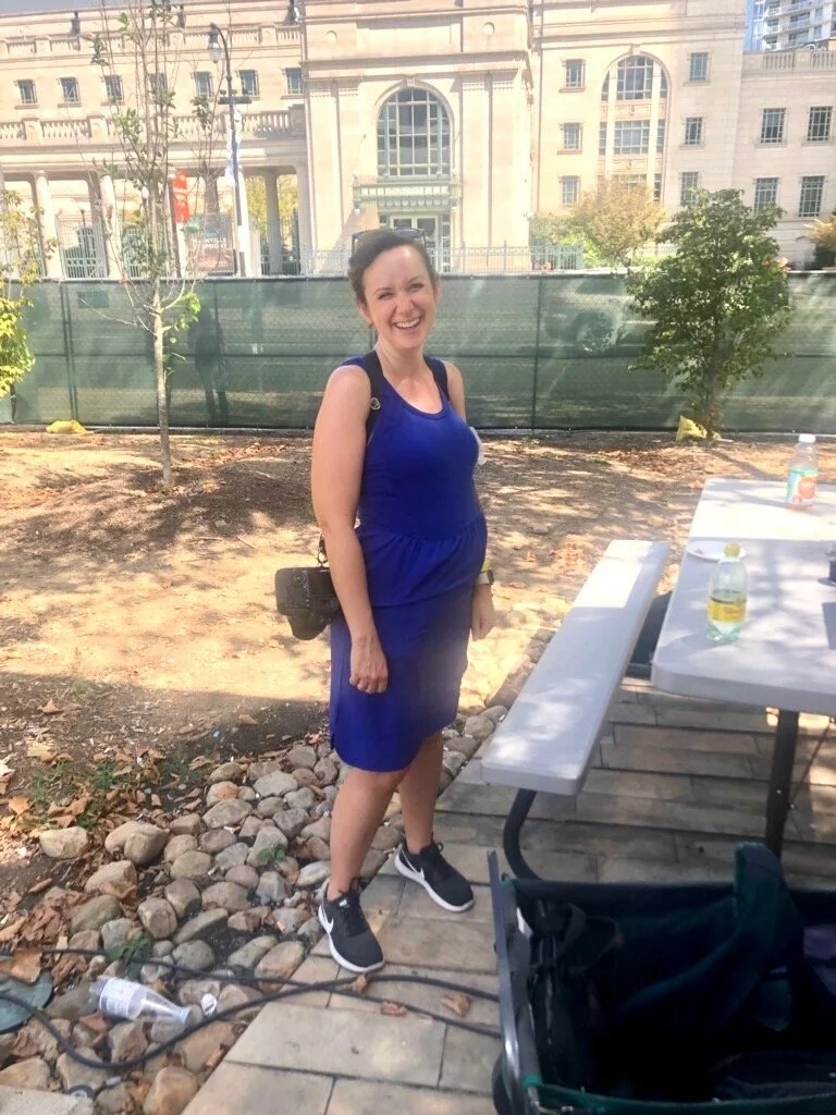 Nashville corporate event photographer Erin Lee Allender photographing Music City Food and Wine Festival while pregnant in September 2019