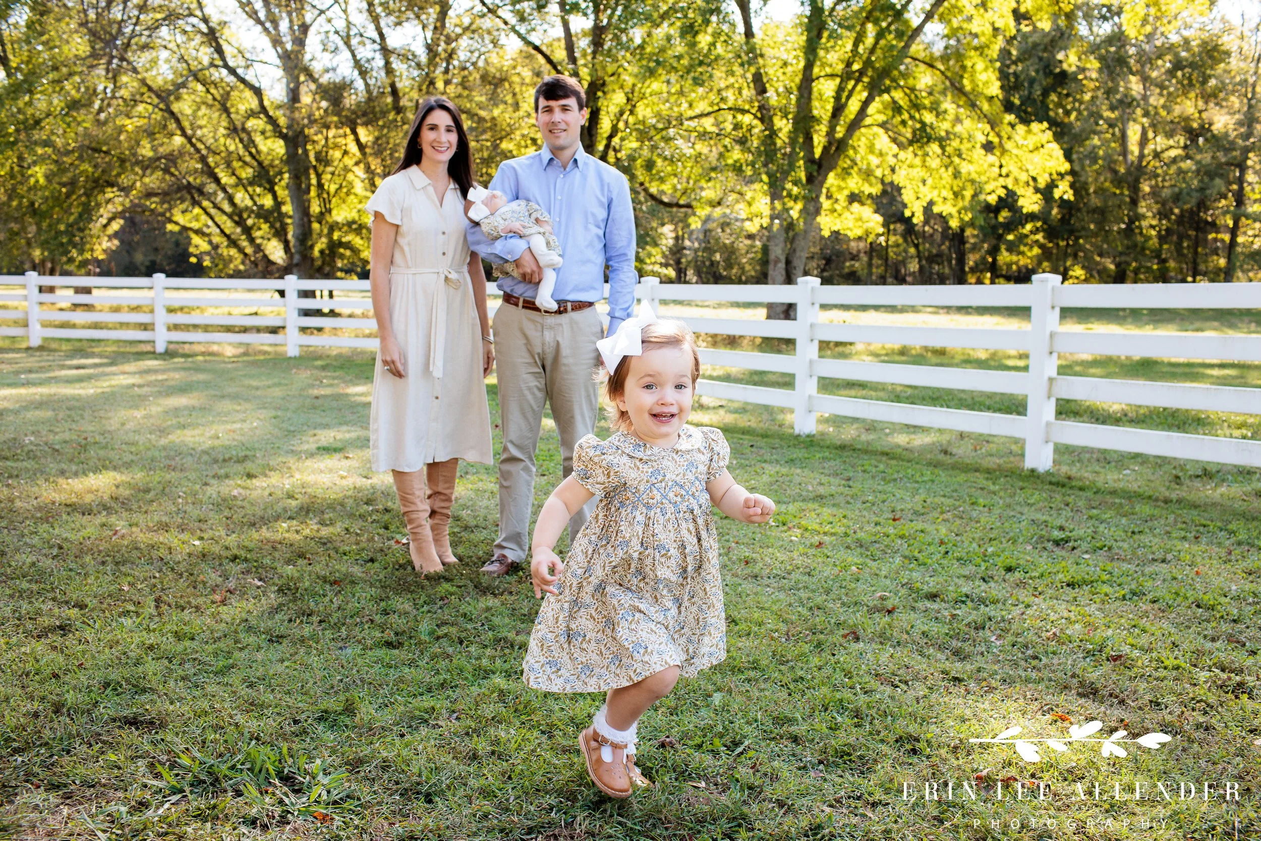Nashville extended family session — little girl running away from the group on the family farm