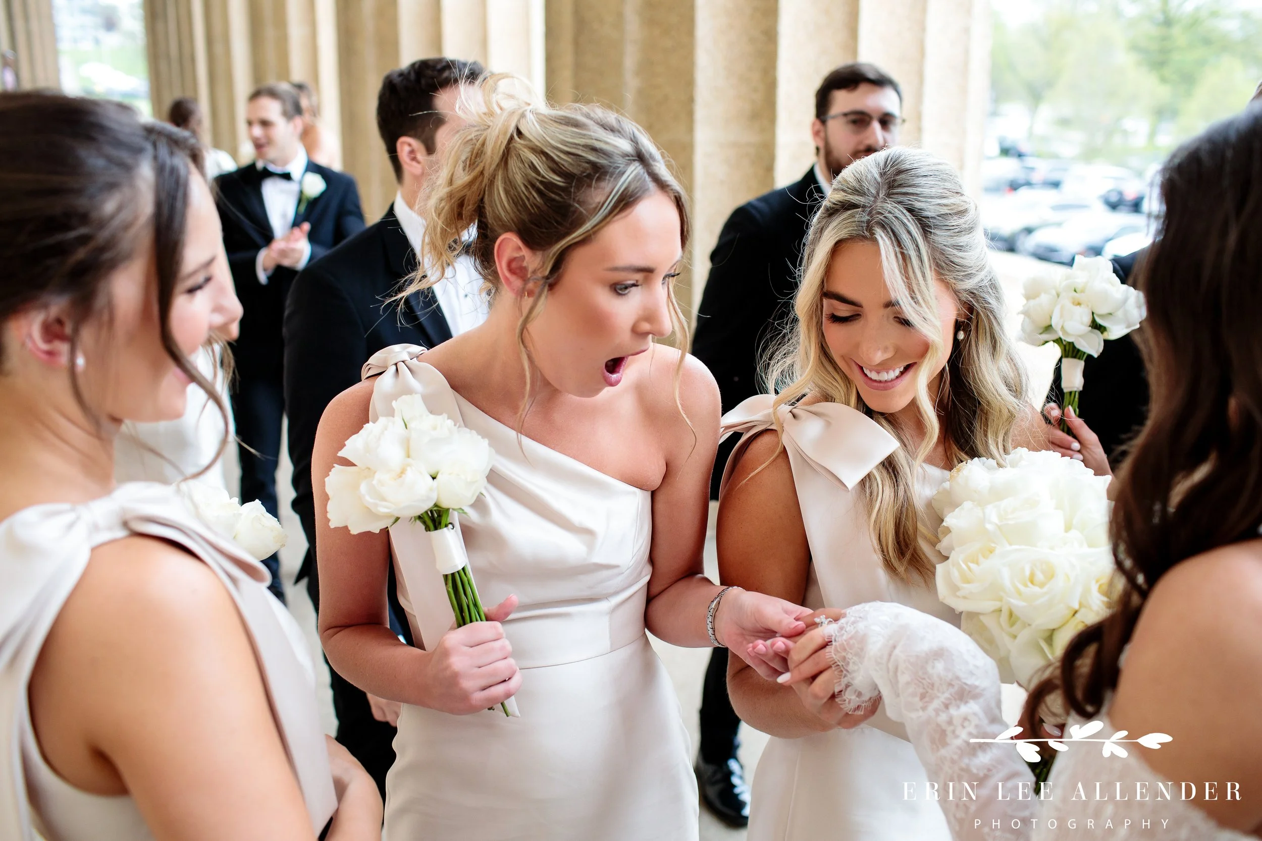 Nashville wedding photography — bridesmaids gasping at the bride's ring during getting ready at the Omni Nashville