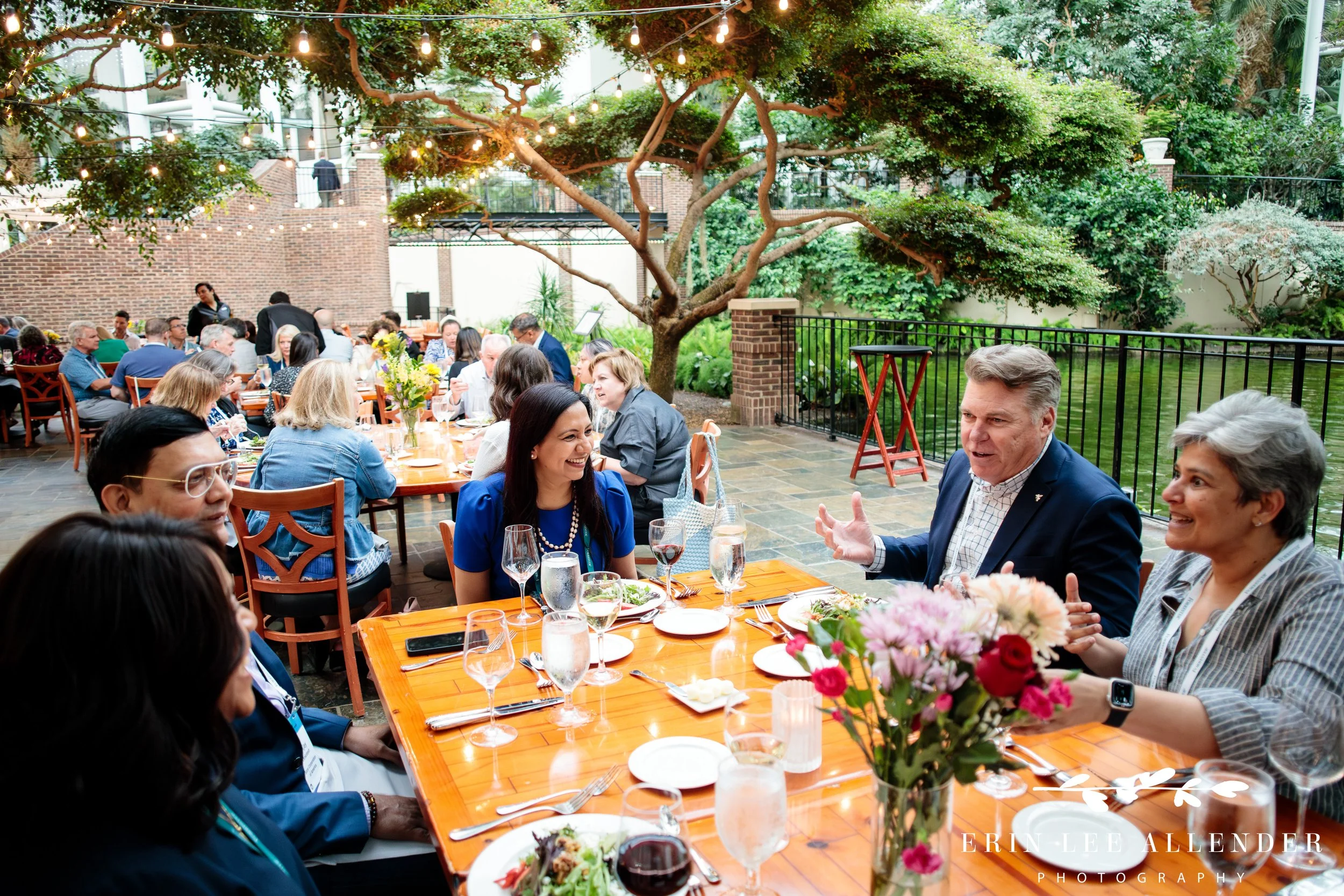 Guests enjoying dinner and conversation at corporate event at Opryland Hotel