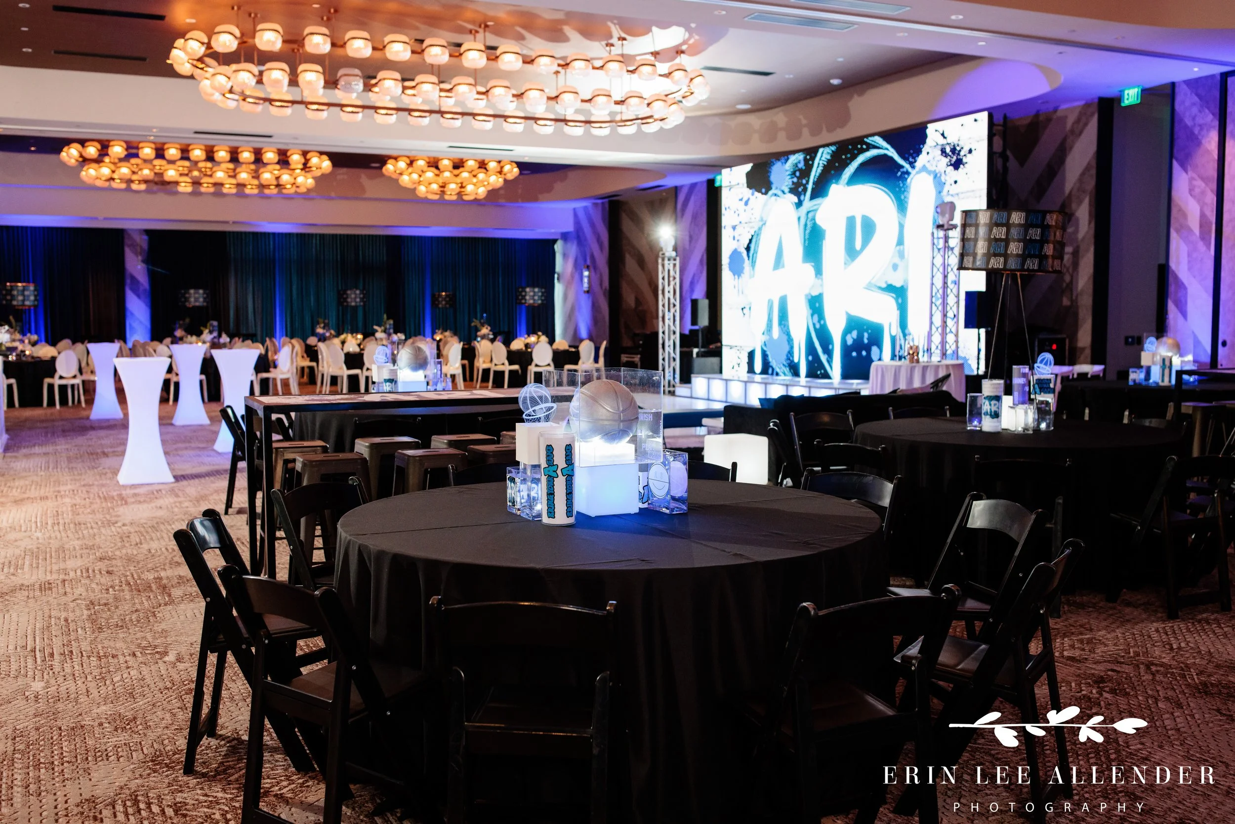 Sports-themed décor in blue, white, black, and silver at W Nashville bar mitzvah reception