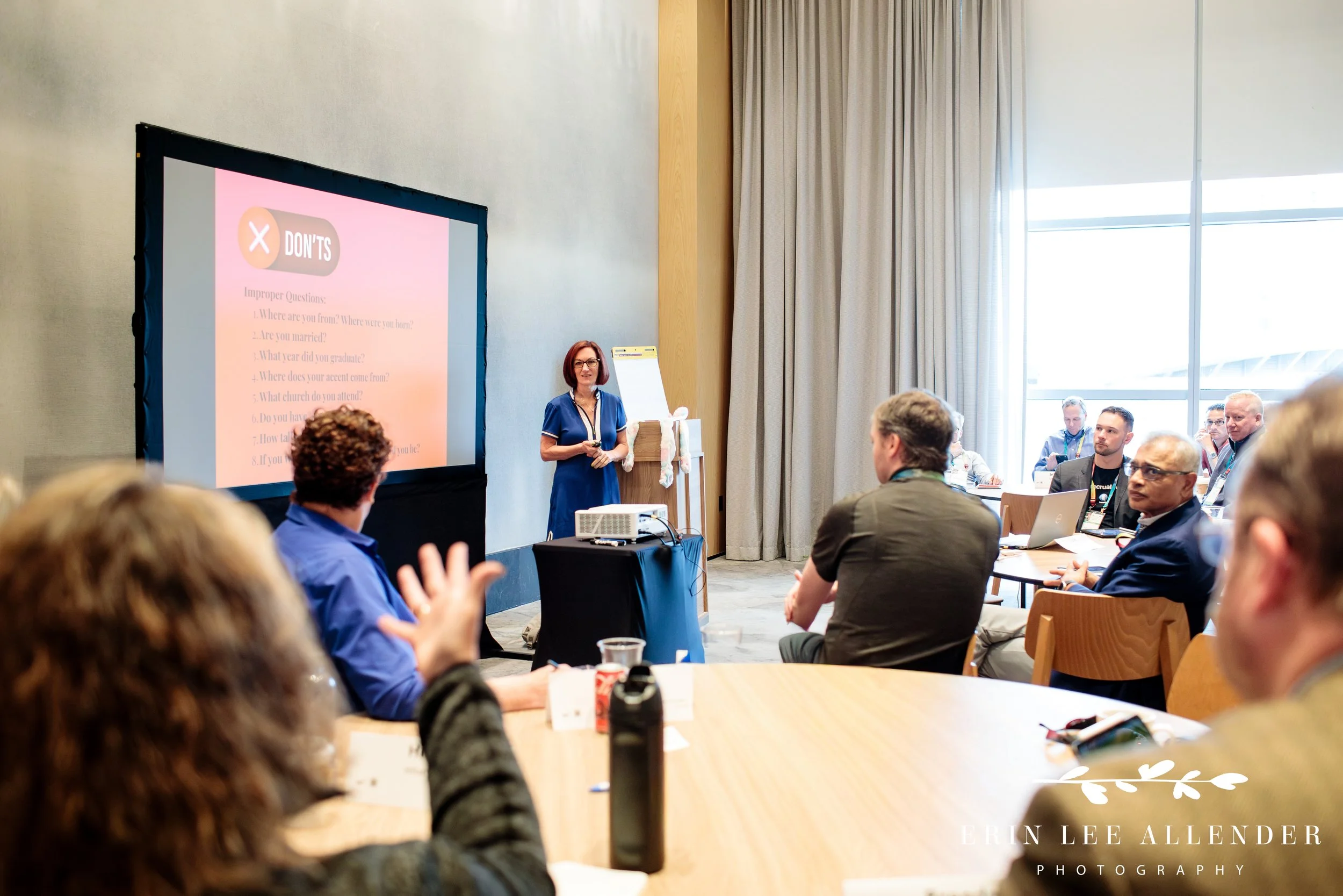 Breakout session with attendees listening during a conference at Embassy Suites Downtown Nashville.