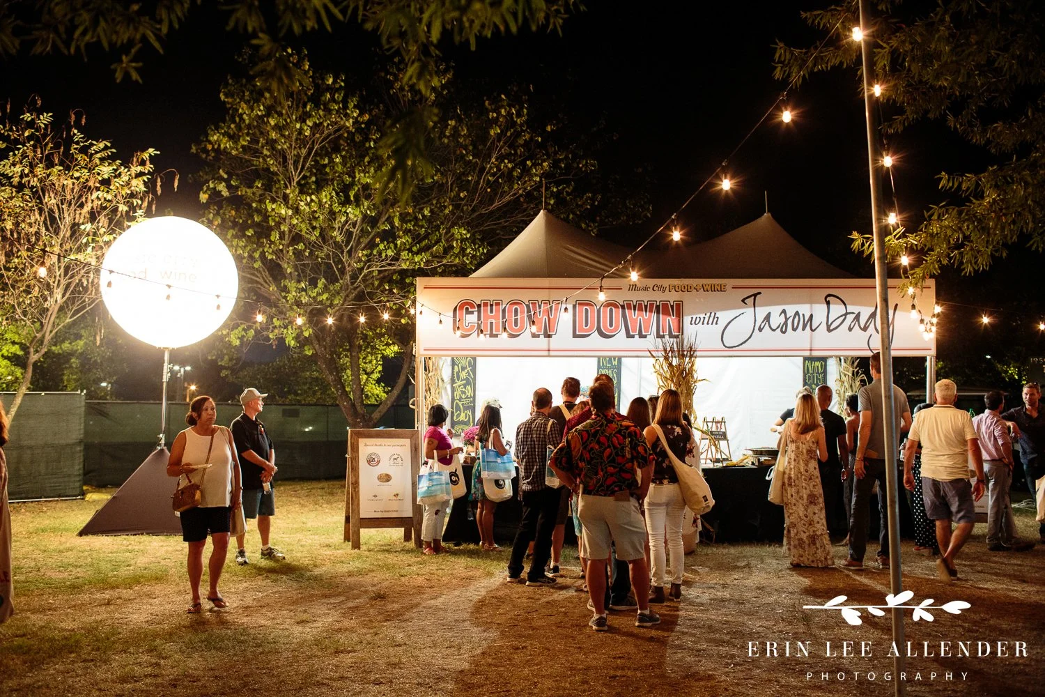 People lining up at a standalone food booth at the Music City Food and Wine Festival Nashville Tennessee