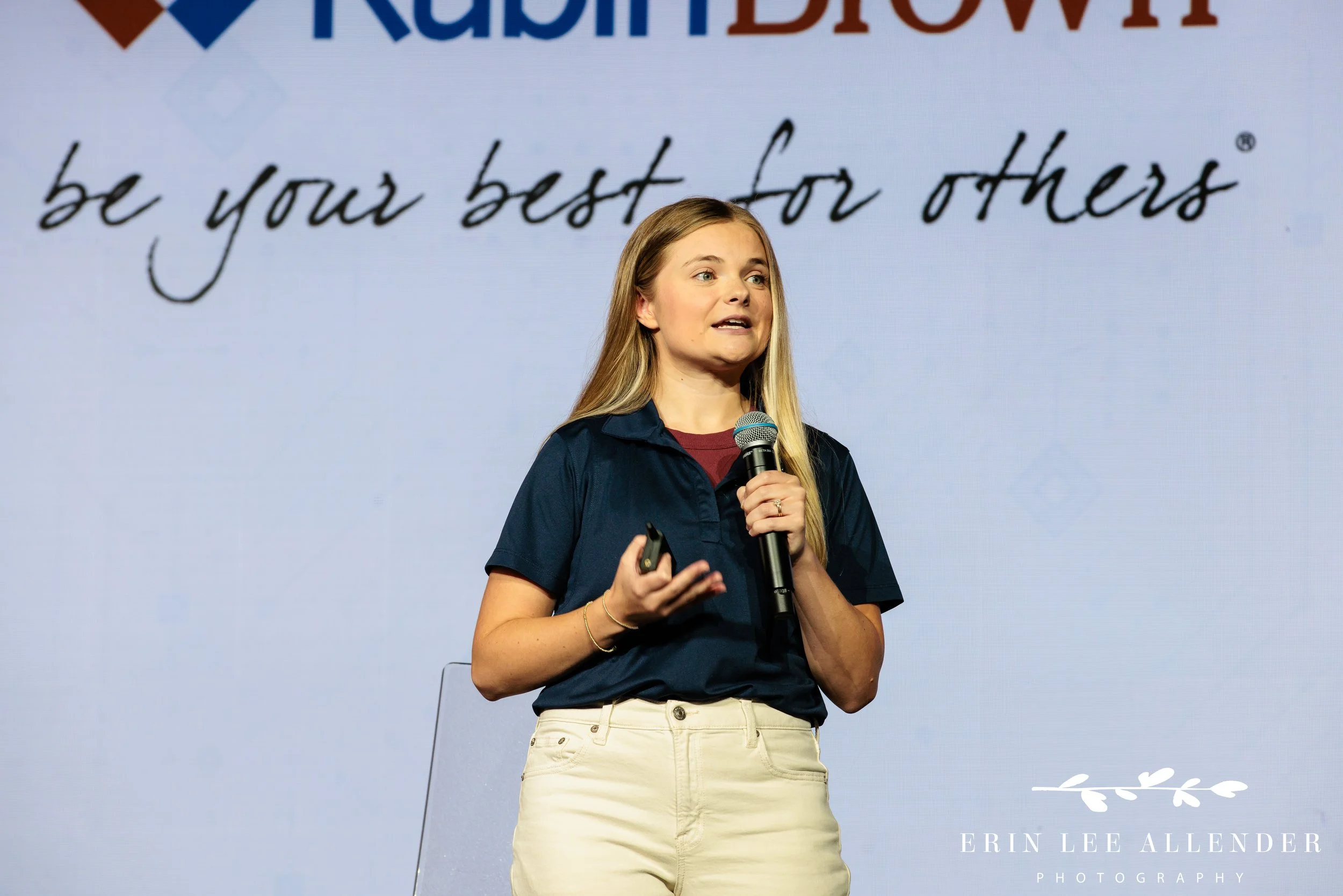 Nashville conference photographer capturing a Hands On team member speaking on stage during RubinBrown's service project at Gaylord Opryland Resort