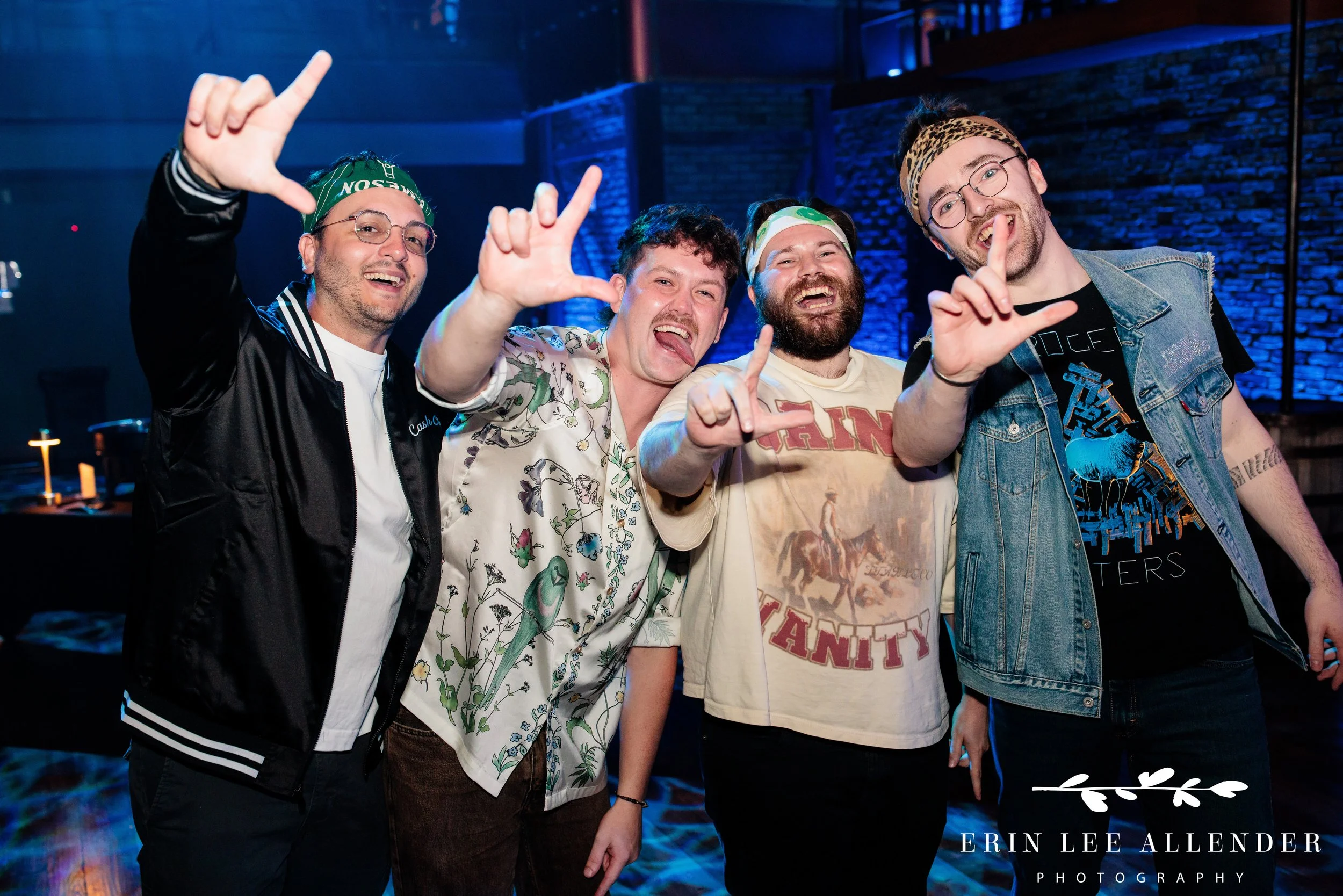 Nashville corporate event photography — ambassadors giving good-natured loser hand sign at advocacy awards dinner, Woolworth Theatre Nashville