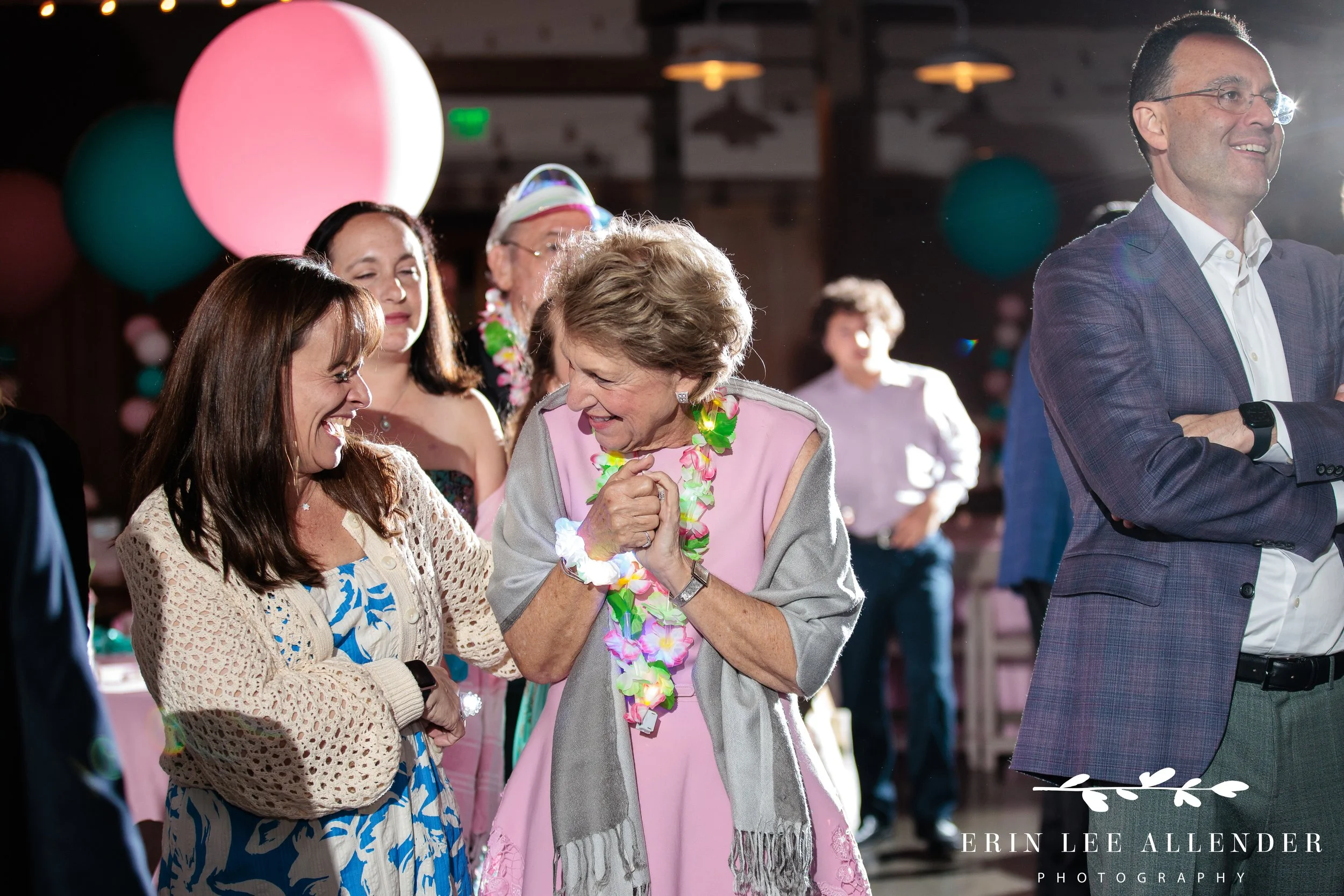 Nashville mitzvah photographer — grandma and rabbi laughing together at Loveless Barn Nashville