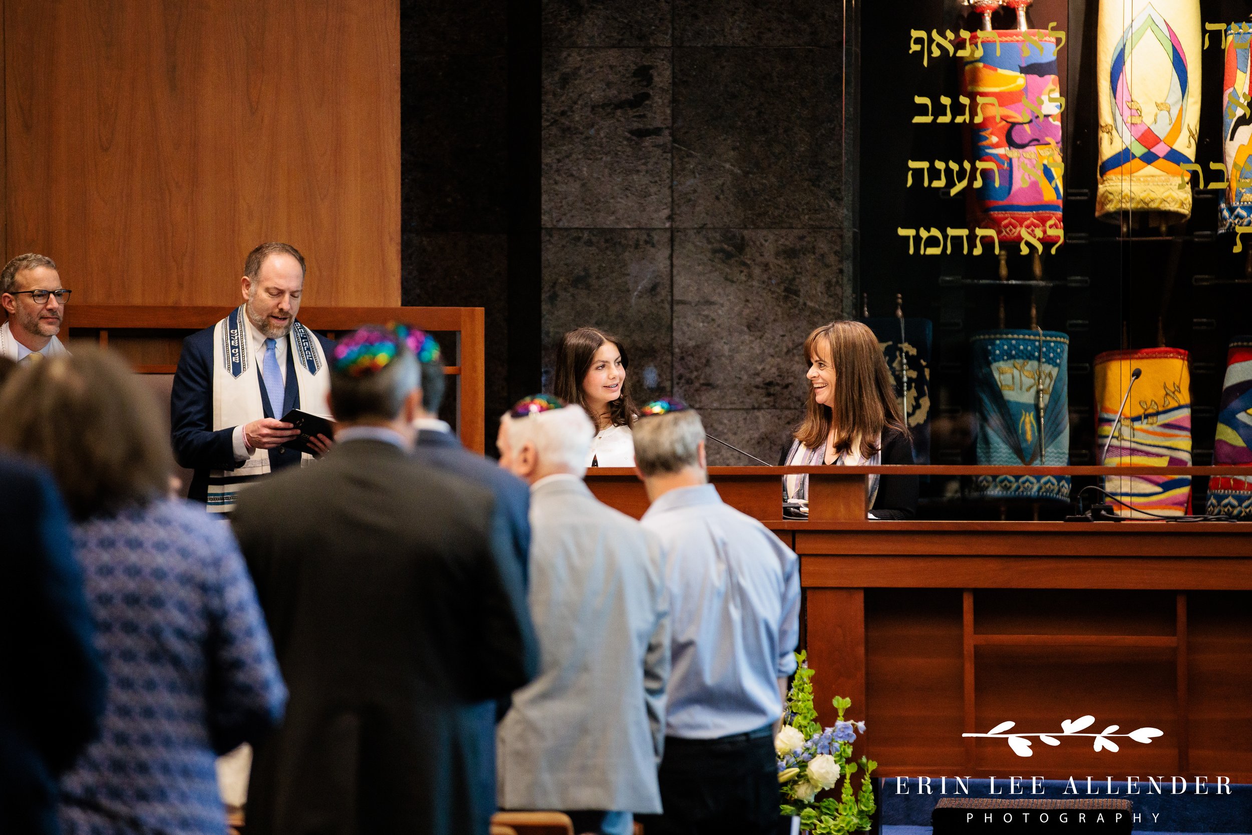 Rabbi smiling during bat mitzvah ceremony