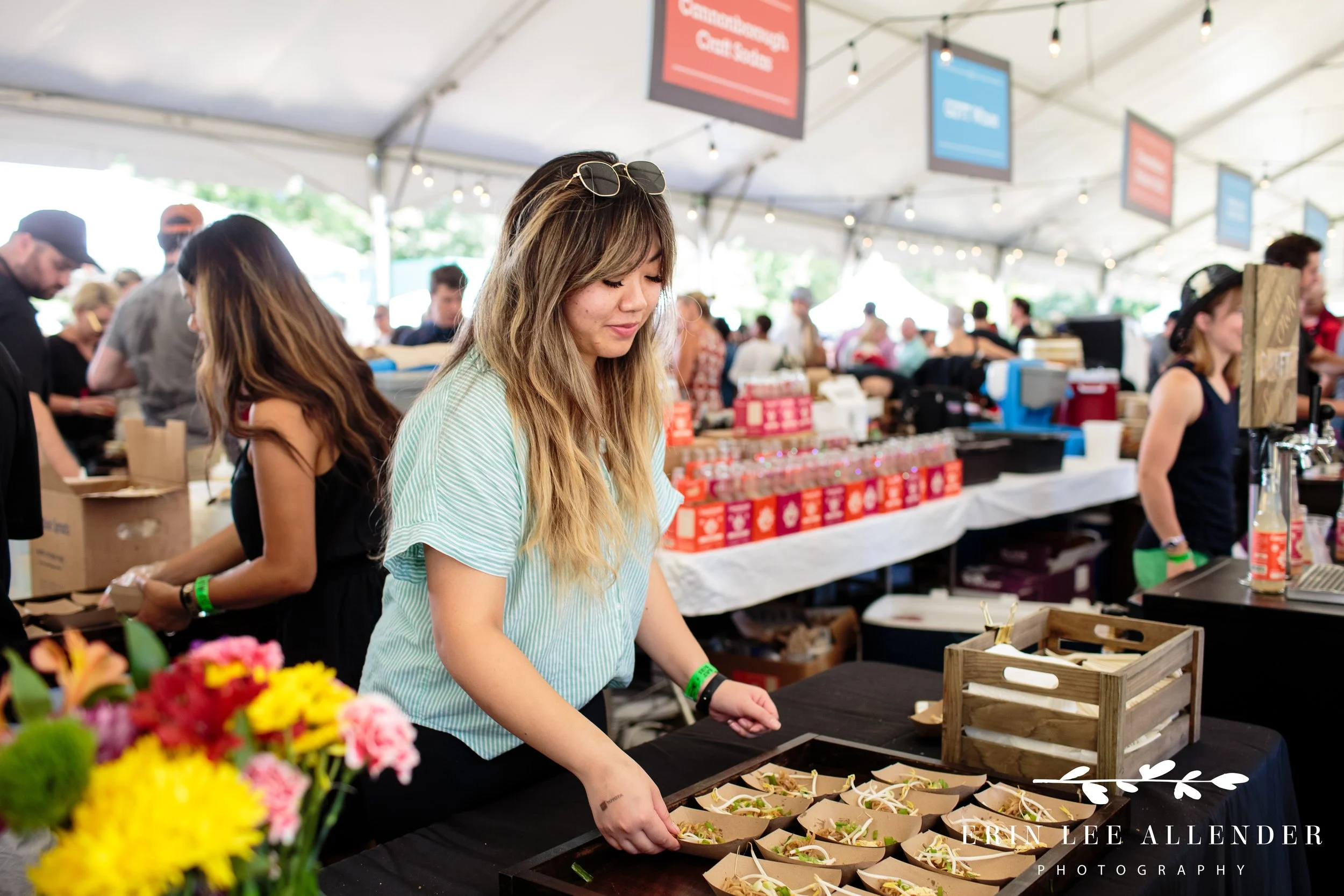 Chef setting up their booth at the Music City Food and Wine Festival food tent Nashville Tennessee