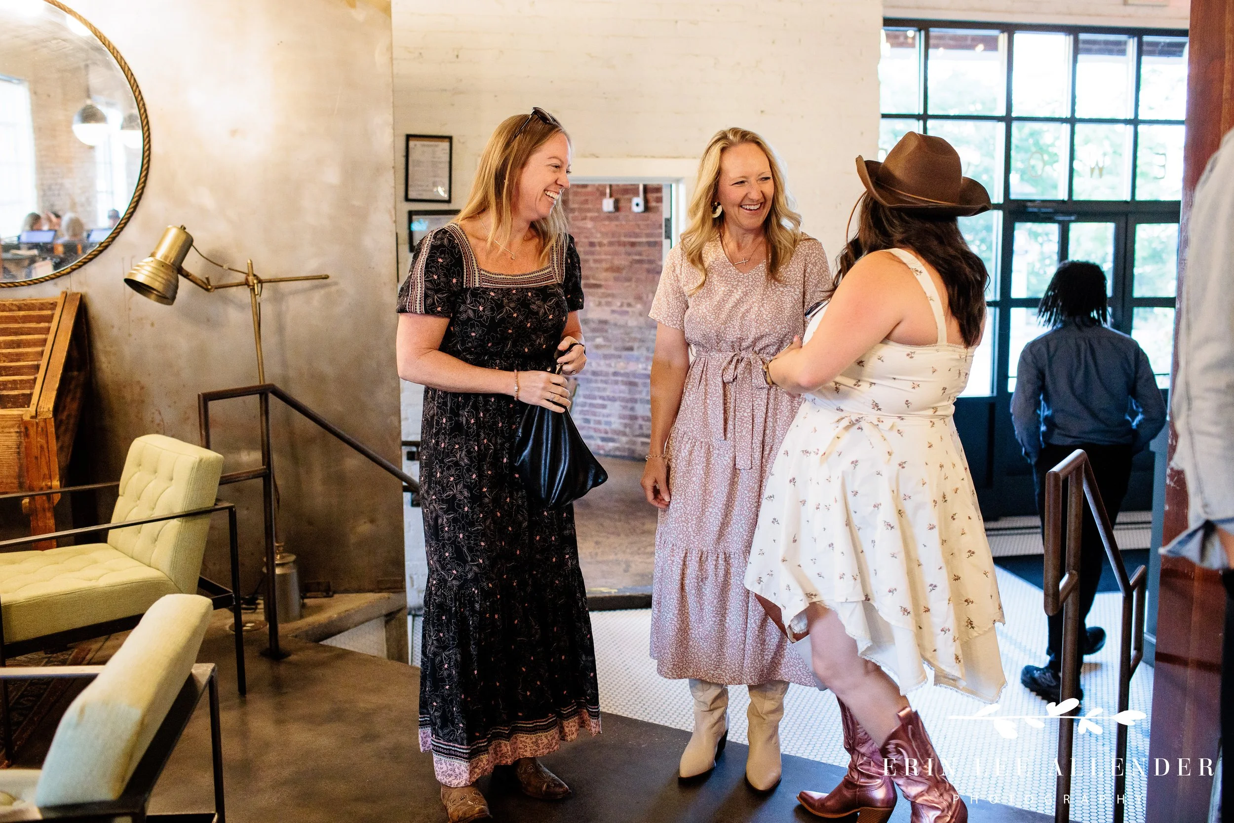 Networking and conversation among guests at Face the Fight welcome party, Pinewood Social Nashville