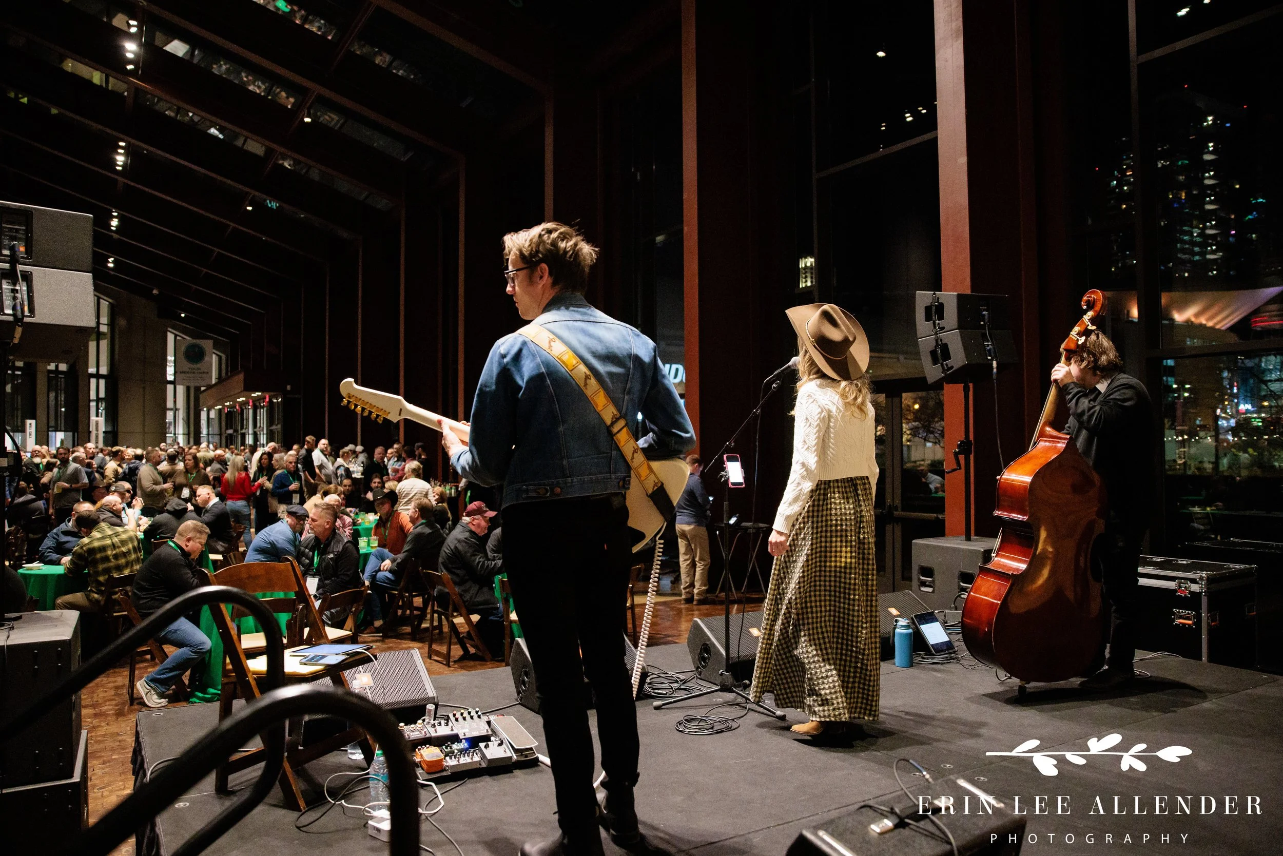 Nashville event photography — view from behind the stage showing TruGreen Leadership Summit attendees filling the conservatory at Country Music Hall of Fame during live music