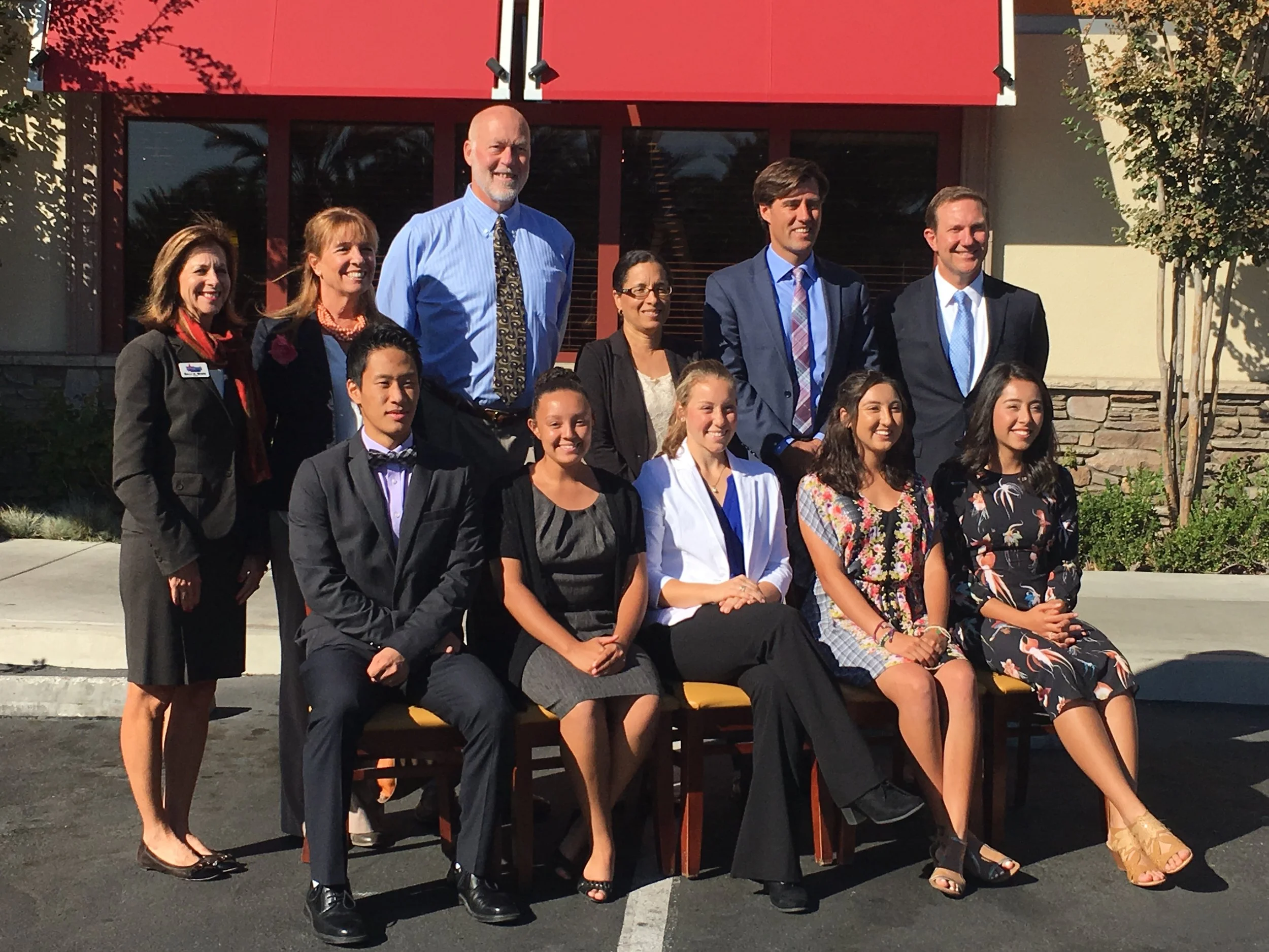 RCHS Principal, Craig Swanson, is 3rd from the left in the back row. Jamie Brown is seated, 2nd from left.