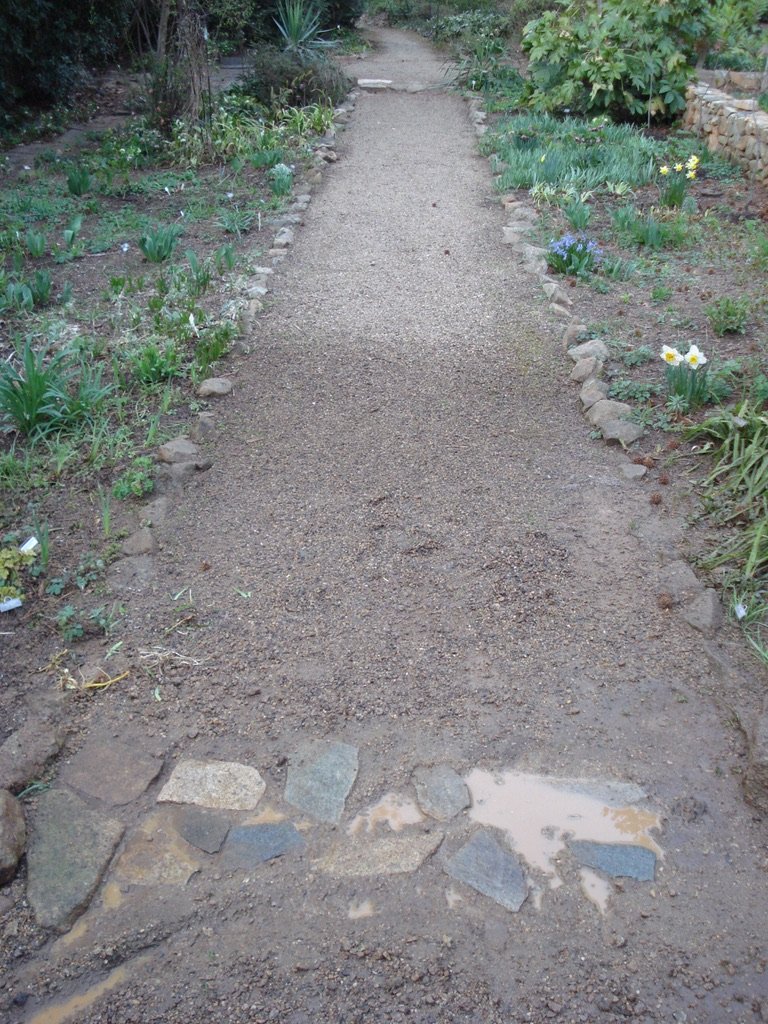  Buried stones are found under 3-4” of path gravel 