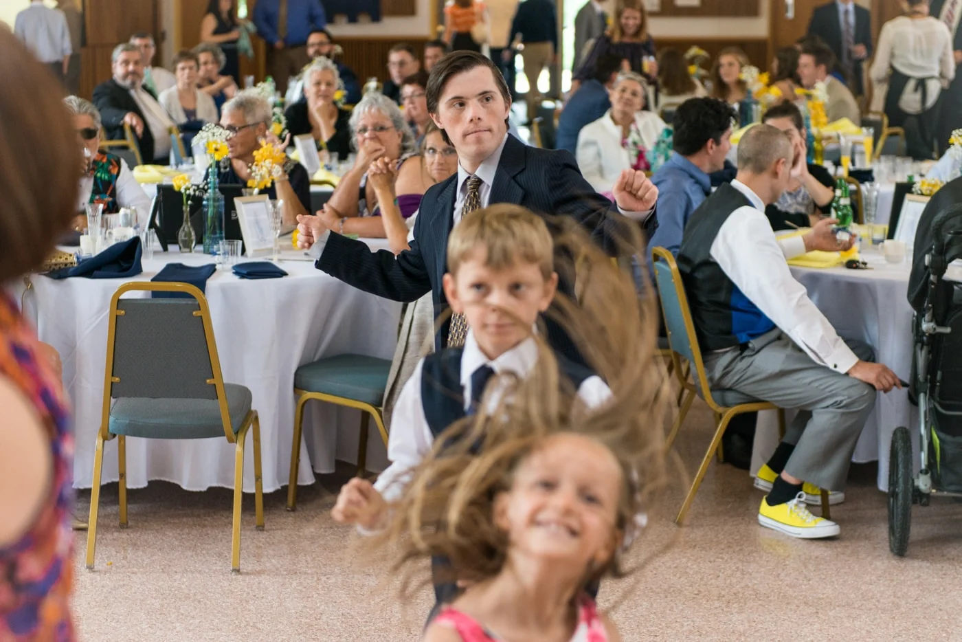 Kids dancing at a wedding reception at St Mark Catholic Church in Vienna, Virginia