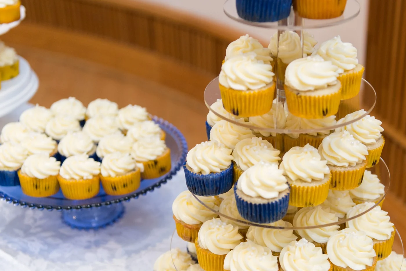 Blueberry cupcakes with vanilla frosting at a wedding reception at St Mark Catholic Church in Vienna, Virginia