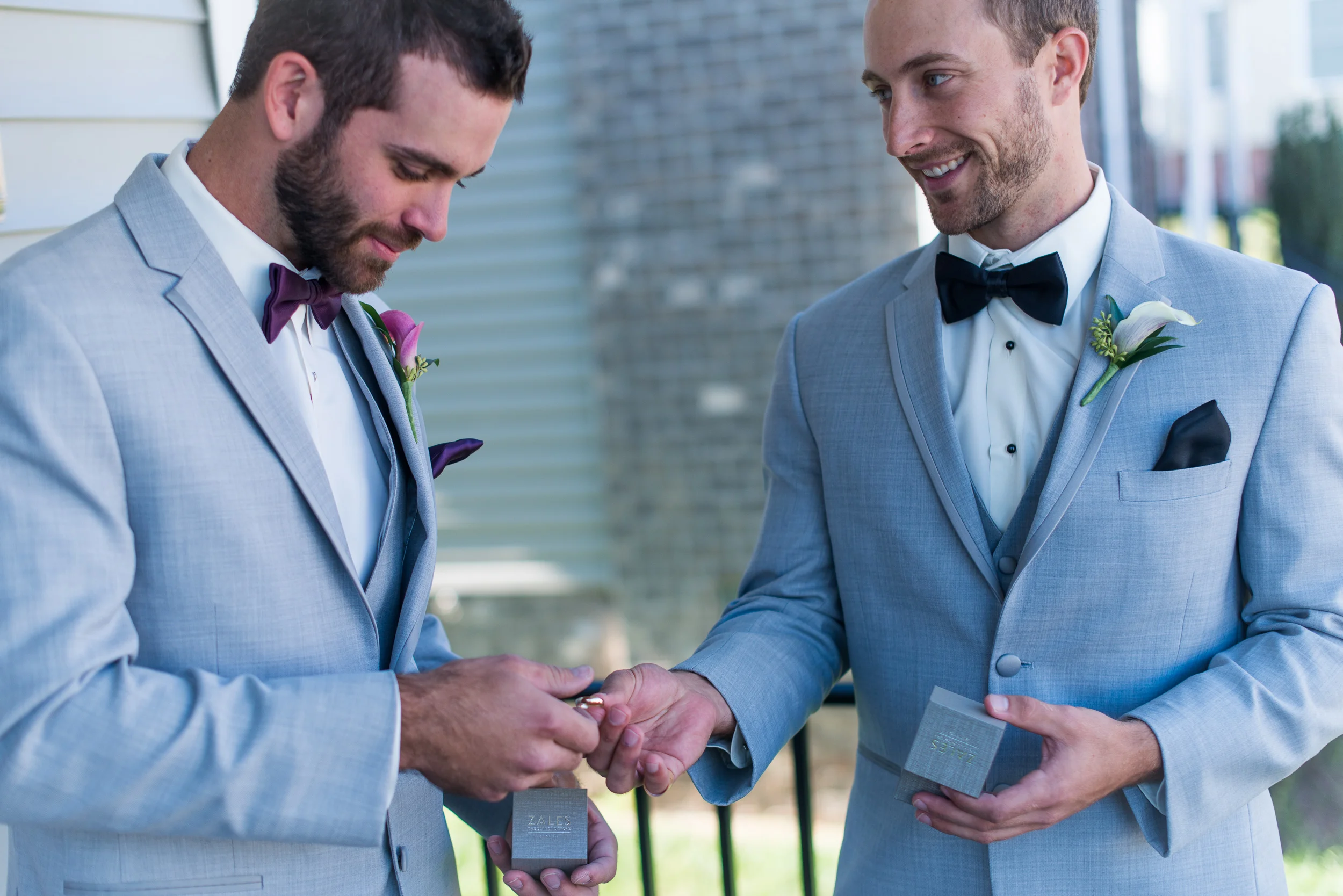 A groom hands off the rings to his best man before the wedding ceremony in fairfax, virginia