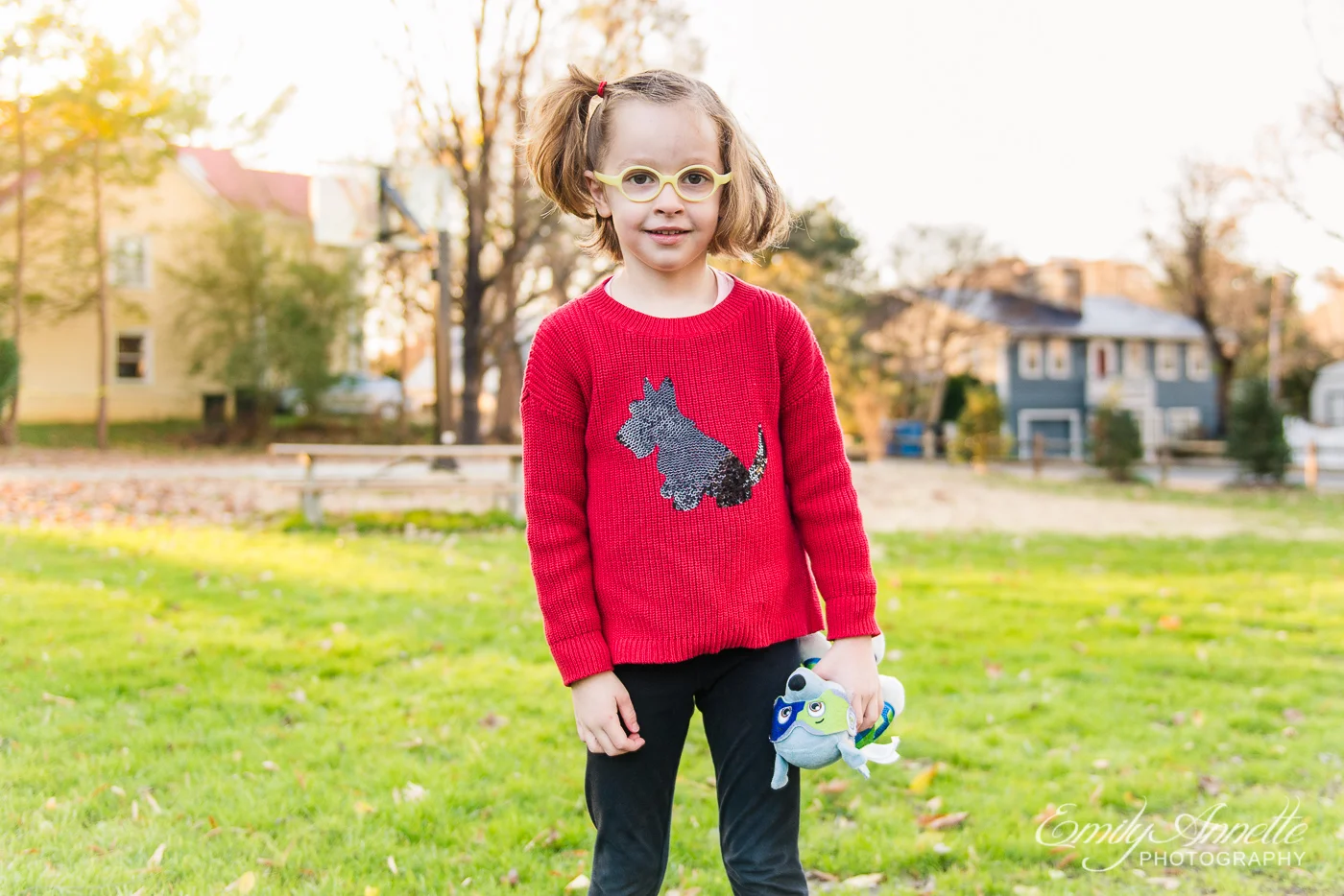 A young girl posing for a photo at Clifton Town Park in Fairfax County, Virginia
