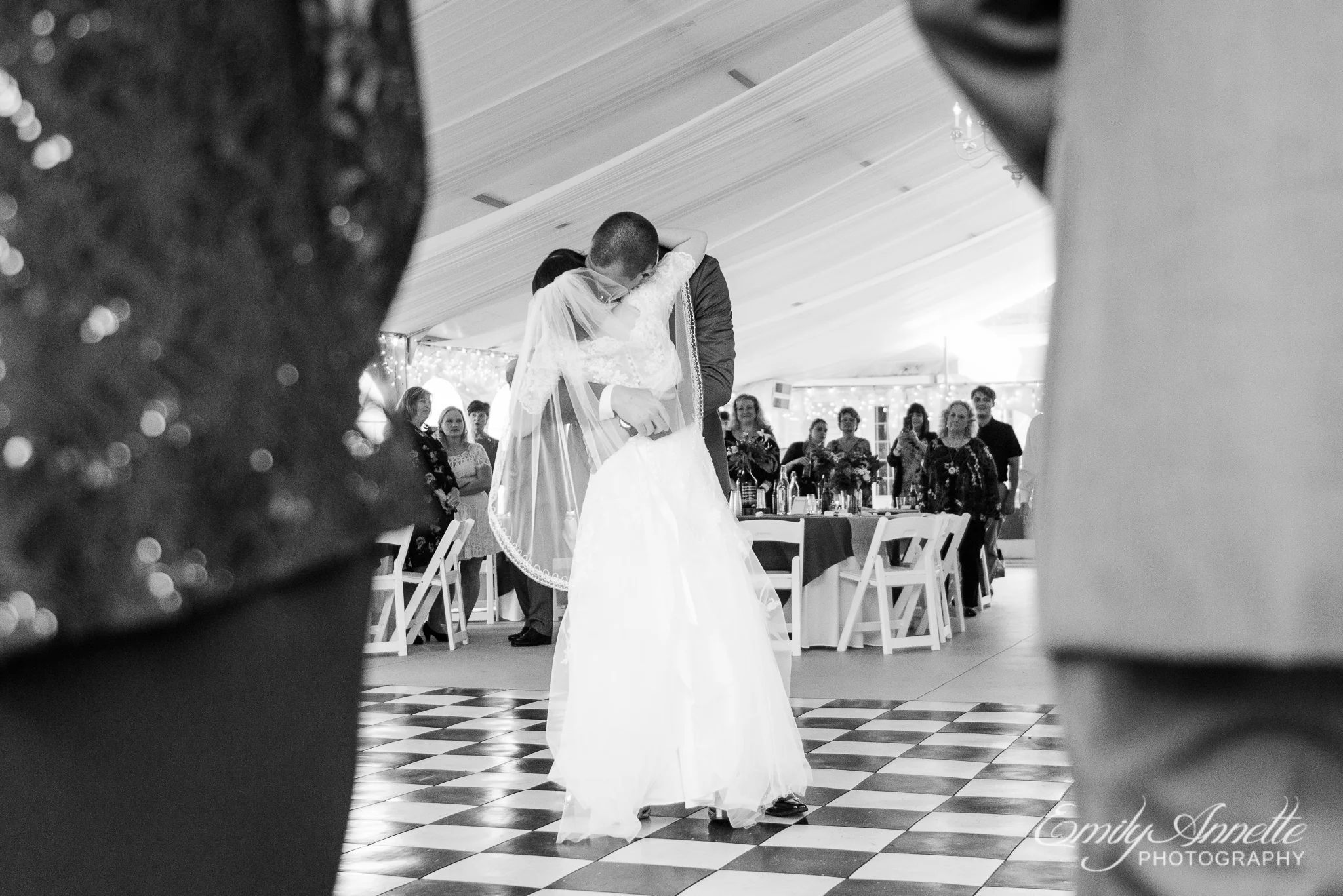 A bride and groom share their first dance as husband and wife during a country wedding reception at Amber Grove near Richmond, Virginia