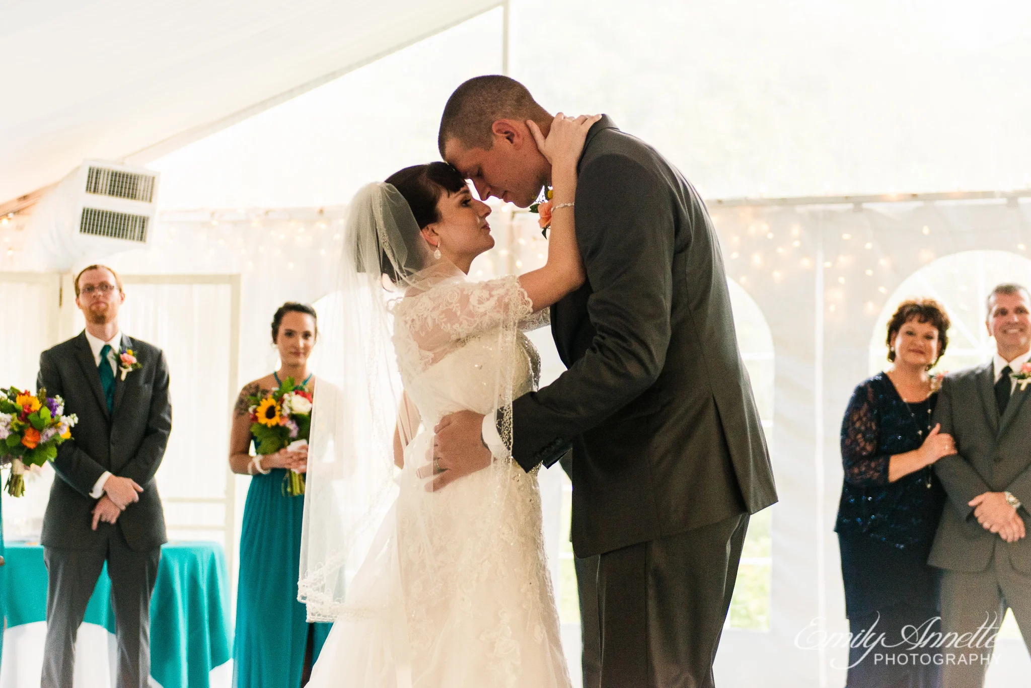A bride and groom share their first dance as husband and wife during a country wedding reception at Amber Grove near Richmond, Virginia