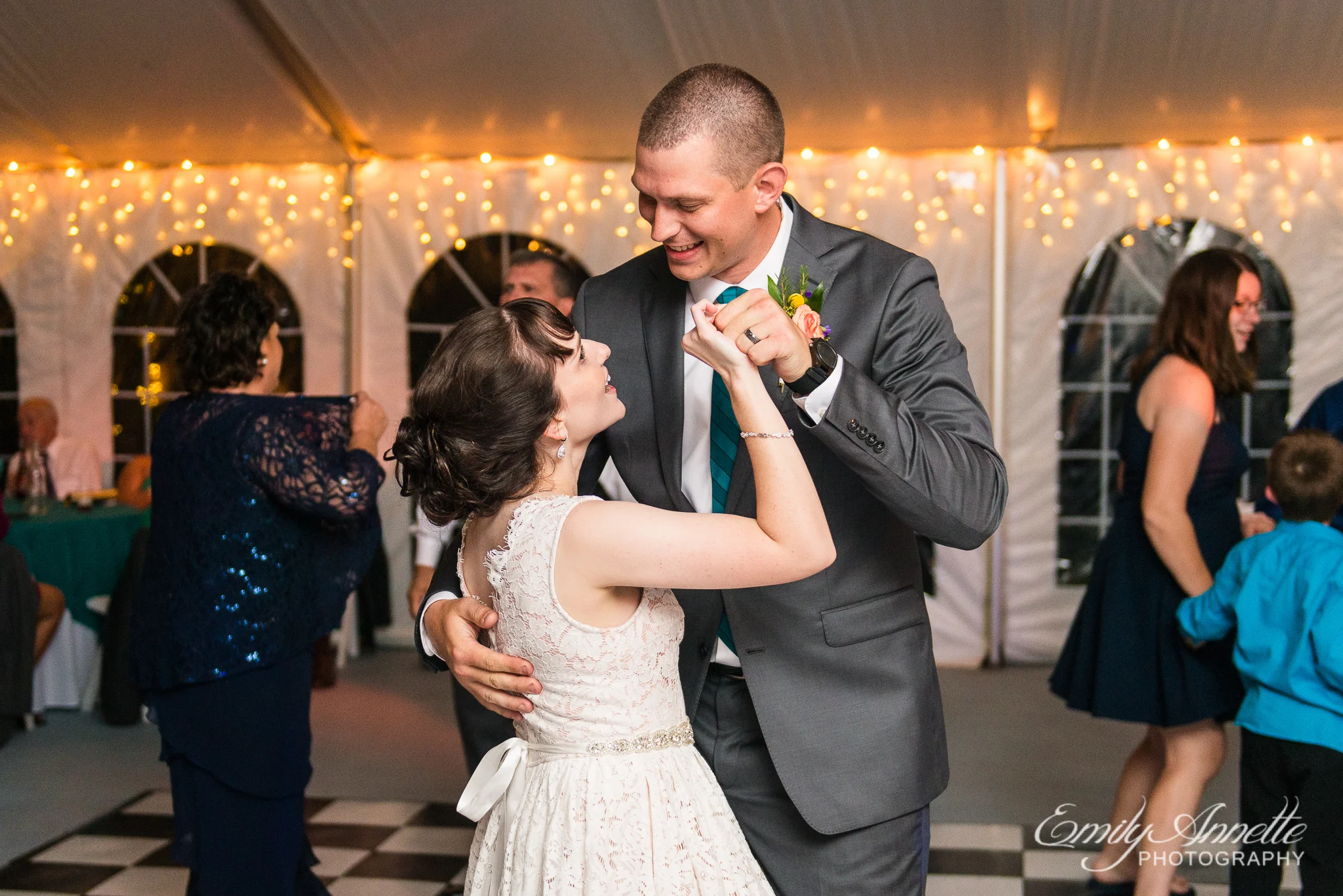 A bride and groom dance together during a country wedding reception at Amber Grove near Richmond, Virginia