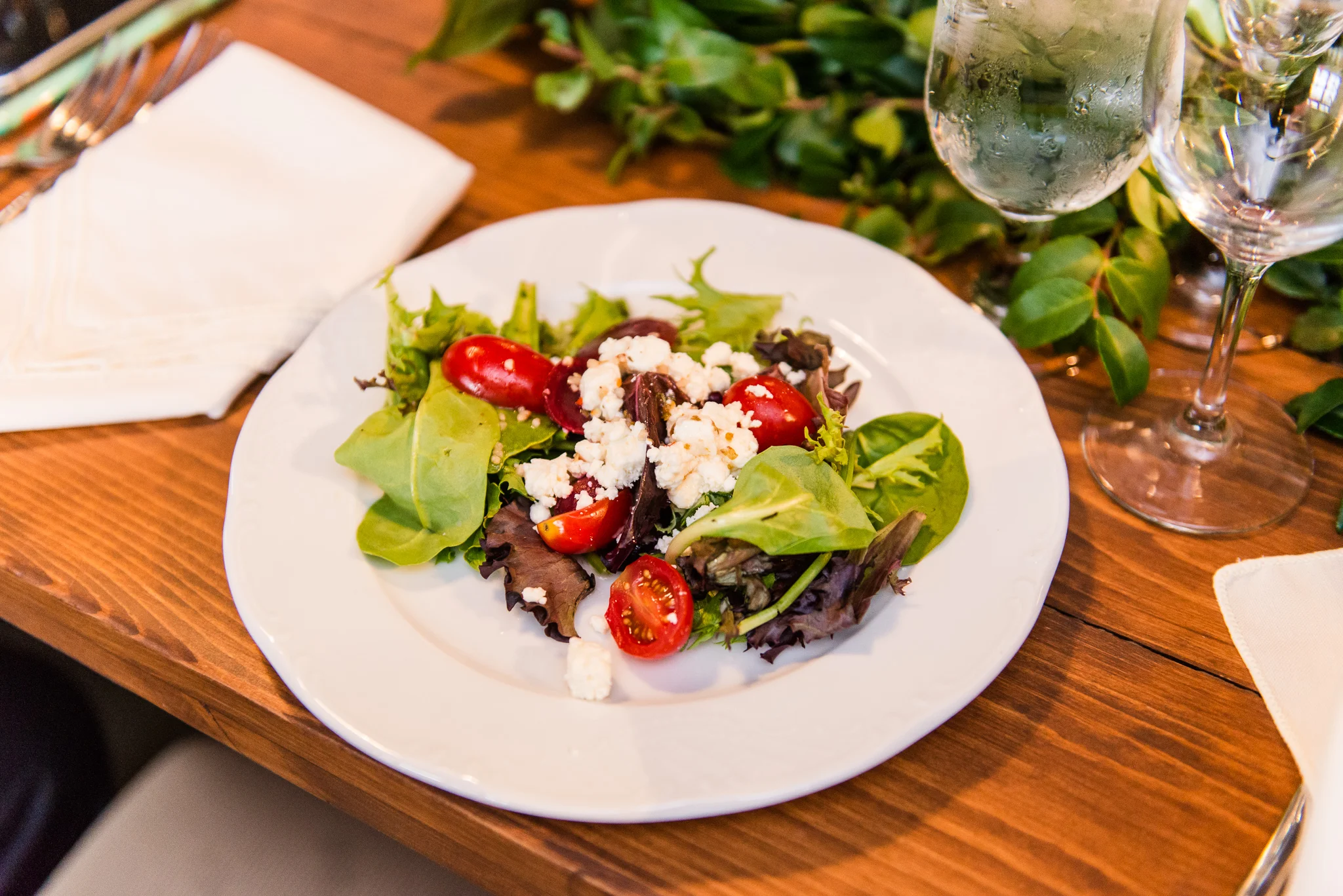 Salad served at dinner for a wedding reception at The Barns at Hamilton Station Vineyards in Leesburg, Northern Virginia