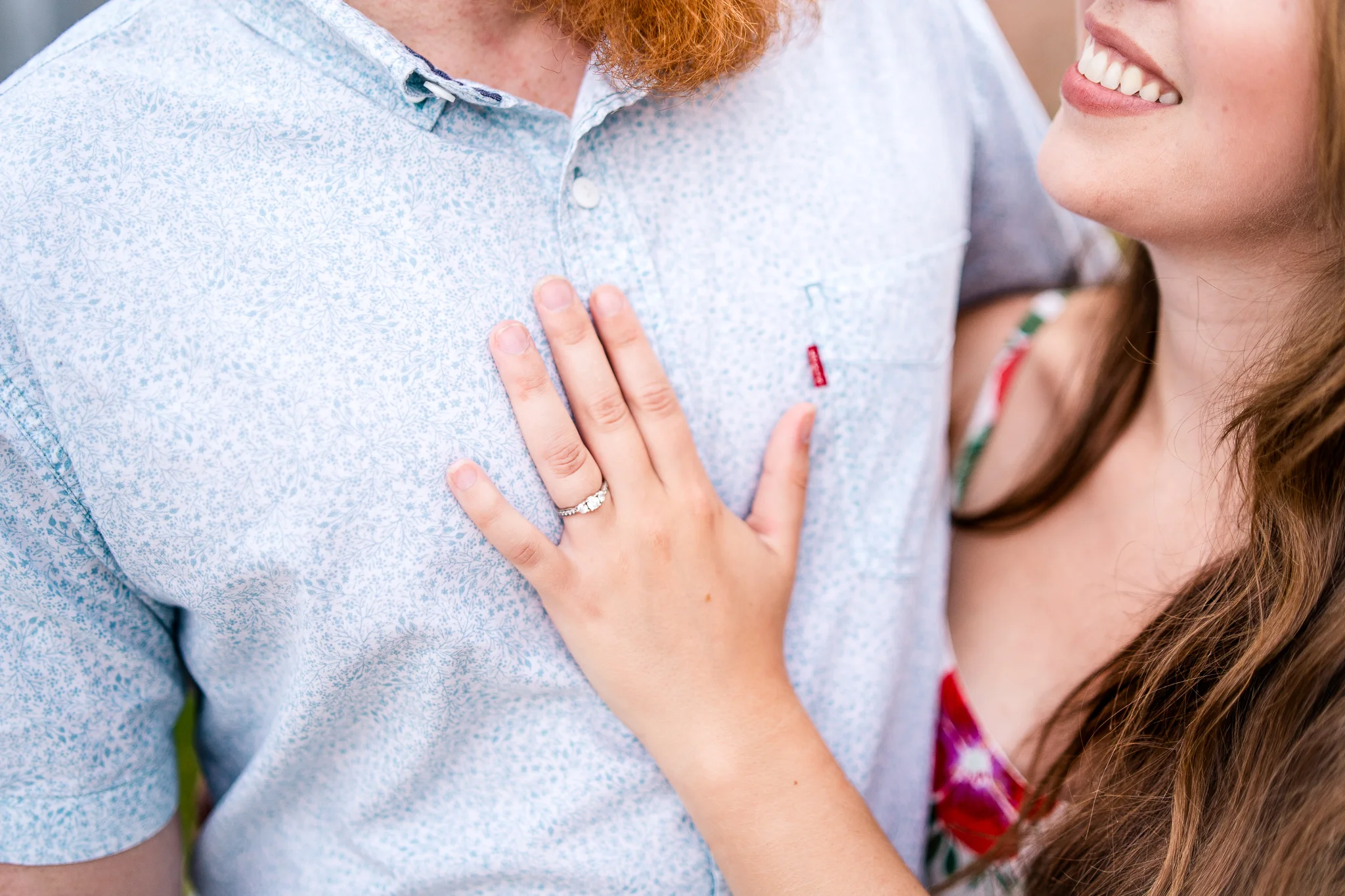 A close-up of an engagement ring during a summer sunset engagement session in Historic Occoquan, Northern Virginia