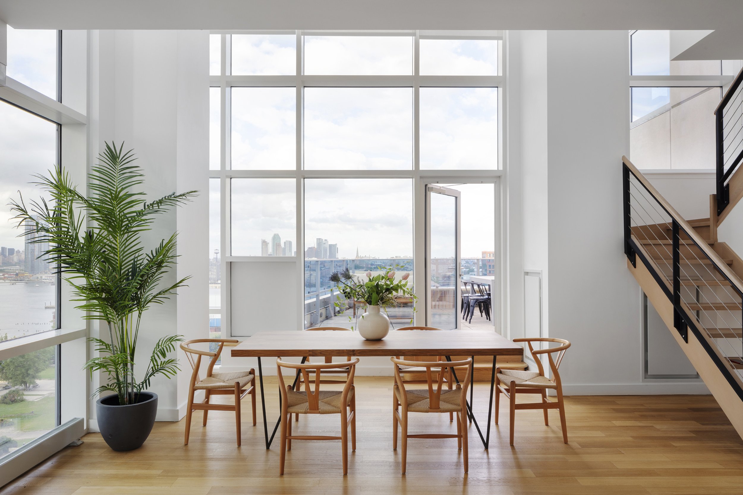  Hovey Design  North 7th Street PH1C   Step into this open 18’4” ceiling height dining room on your way to the 347.8 sqft private balcony as you overlook Brooklyn’s water front. Sold by Harkov Lewis Team at Halstead and staged by Hovey Design this th