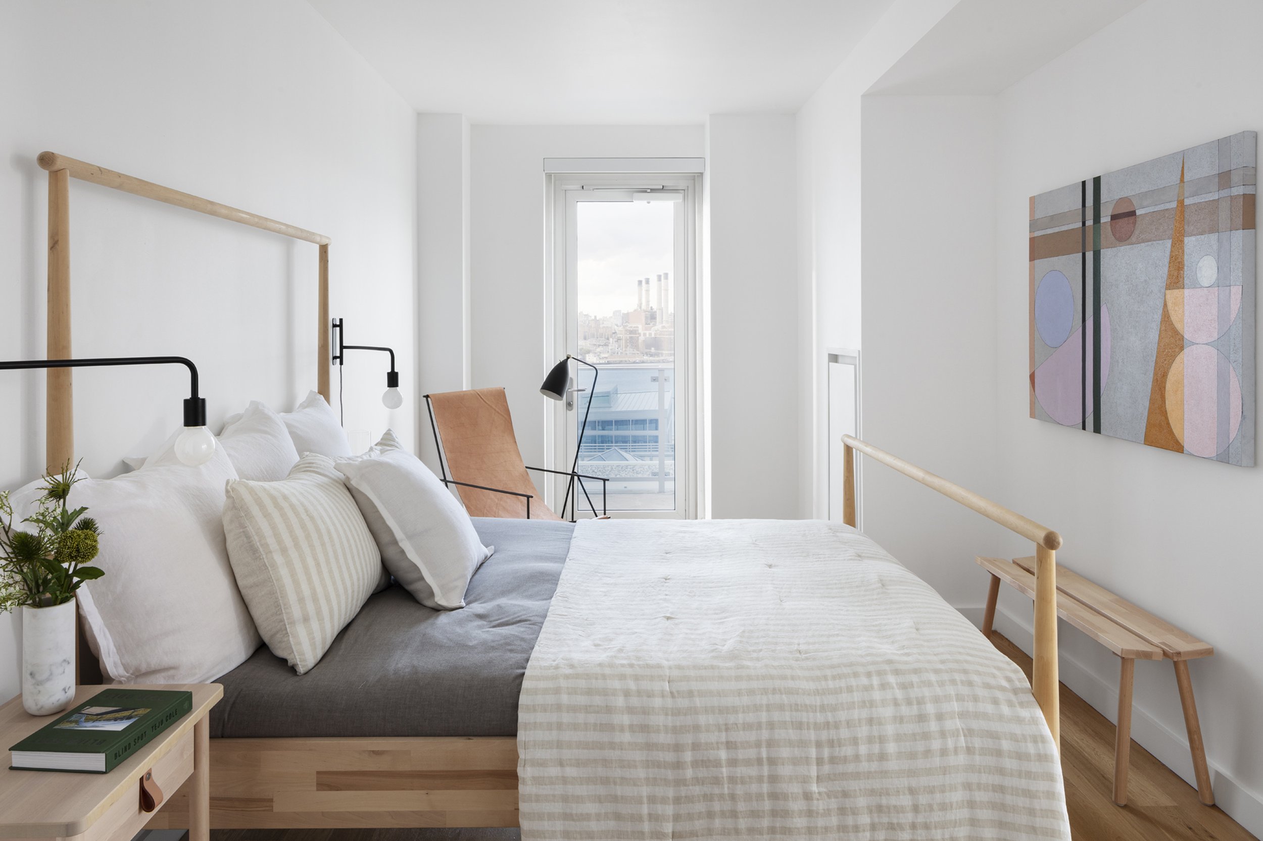  Hovey Design  North 7th Street PH1C   The far side of this bedroom opens to a private balcony looking at Manhattan. Located in the Edge building in Willamsburg this duplex condo sold by Harkov Lewis Team at Halstead was staged by the sisters at Hove