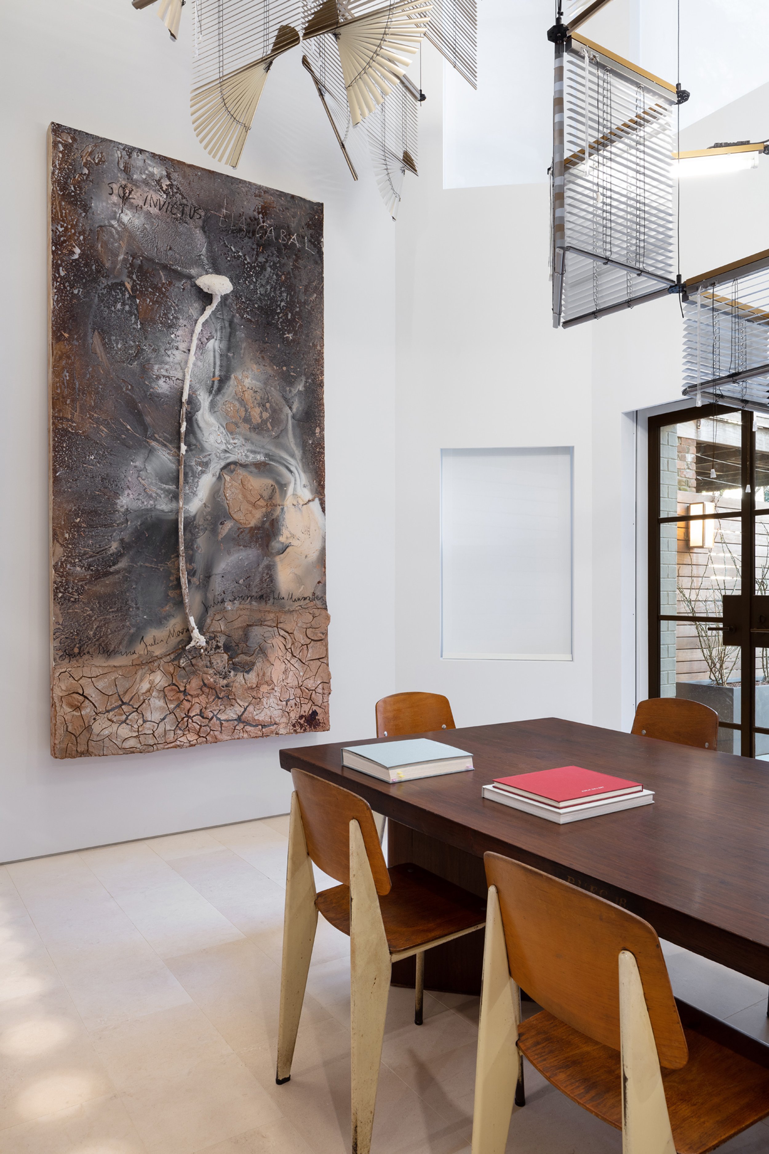  Charlap Hyman &amp; Herrero  Tina Kim Townhouse   Featured in Galerie Magazine December 2019 is Tina Kim’s townhouse. Beneath the Haegue Yang installation in the double-height formal dining area, an Anselm Kiefer work hangs near a Pierre Jeanneret t