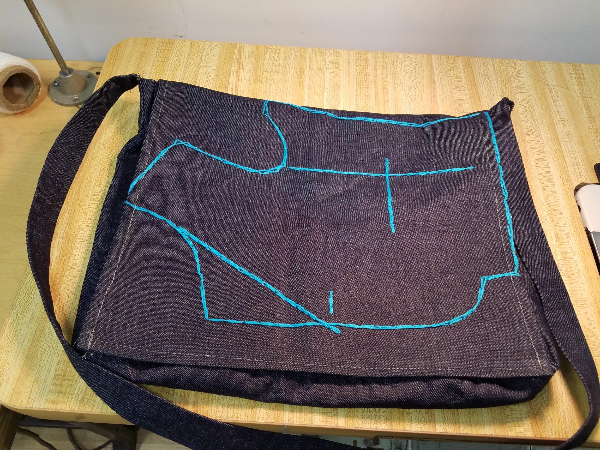 My end of semester project, a messenger bag, completed at Manhattanville Tailors Institute.
