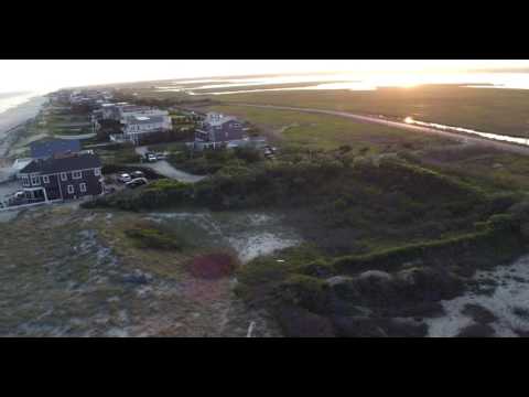 Low approach and arch around Hamptons beach houses