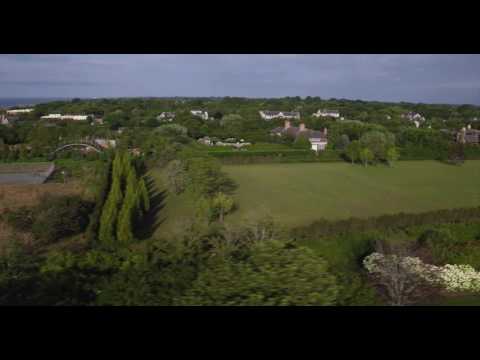 Aerial pass through beach estates on Further Lane, East Hampton, Long Island